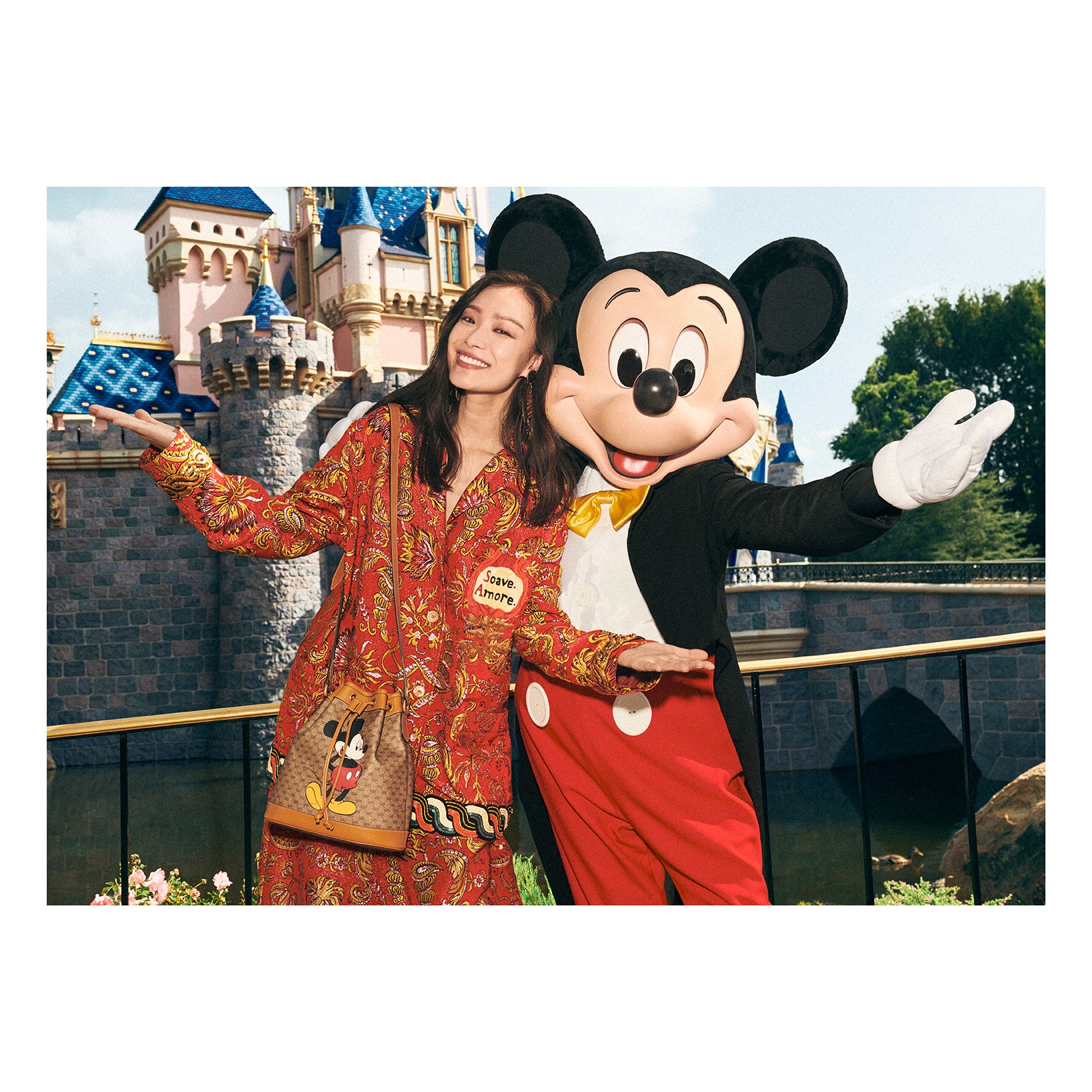 Playing in Disneyland, wearing pieces from the Disney X Gucci