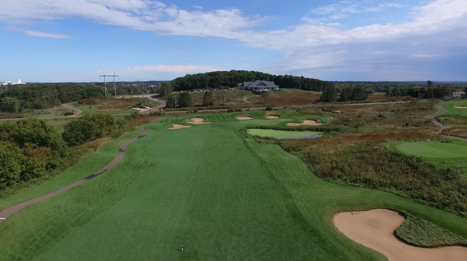 Wild - Hole 18 view from the fairway, water infront of the green ...