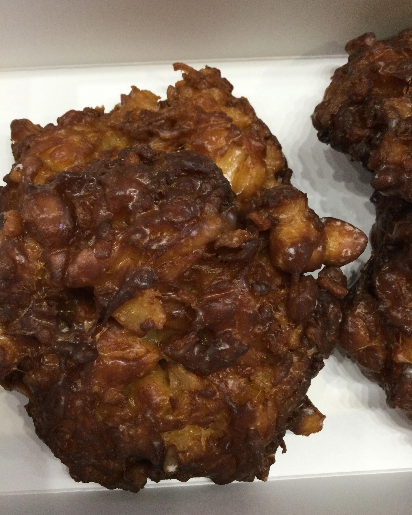Rebus Works - We have fresh donuts and apple fritters from...