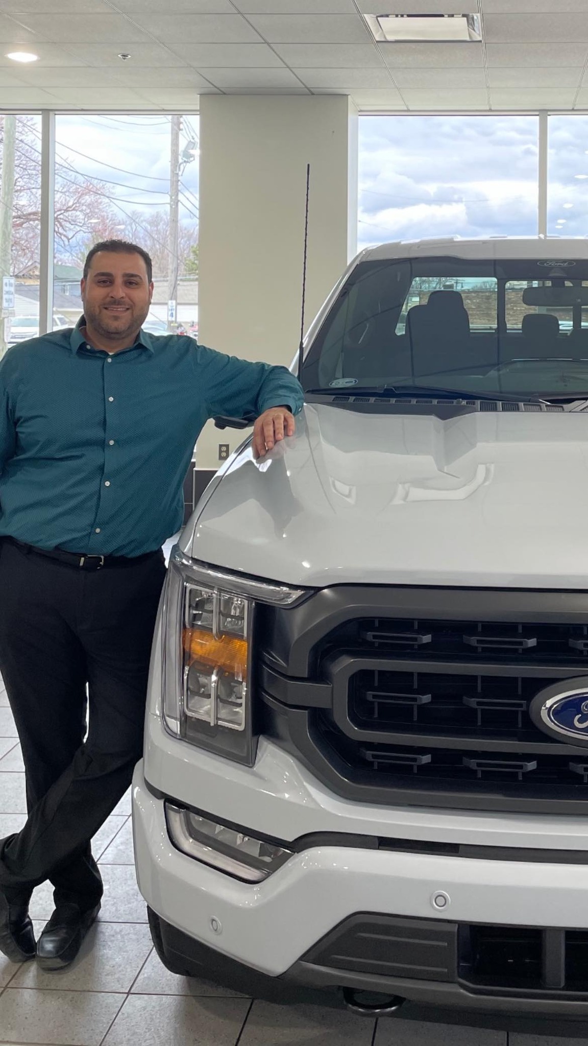 Say hello to our newest sales... - Roy O'Brien Ford, Inc.