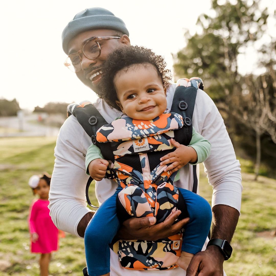 Ergobaby - Introducing our NEW print, Papaya Flower, in our Omni