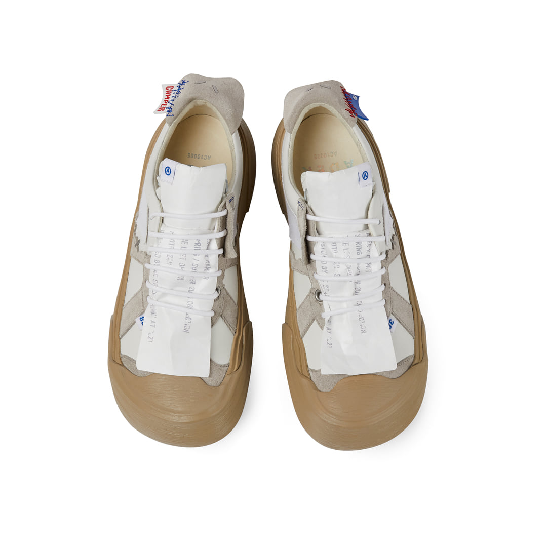 Deconstructed sneakers designed in collaboration with ADER