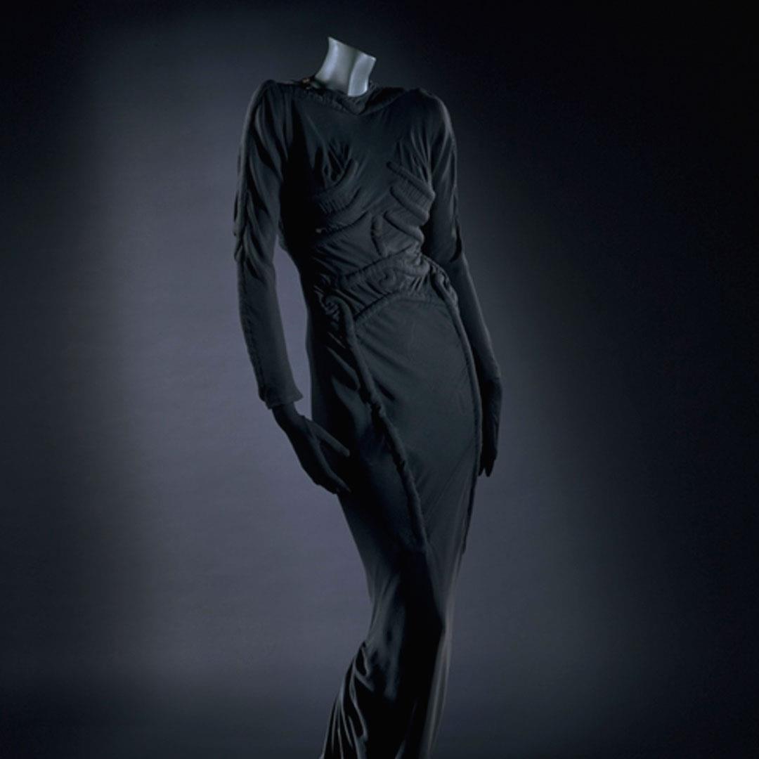 scary black dresses Style so good it's scary… Elsa Schiaparelli used clever layering, quilting and padding to make the large bones on this skeleton evening dress 💀 Renowned for playing with subversive details and while the glittering scream