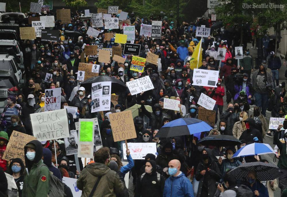 The mass protests against police... - The Seattle Times