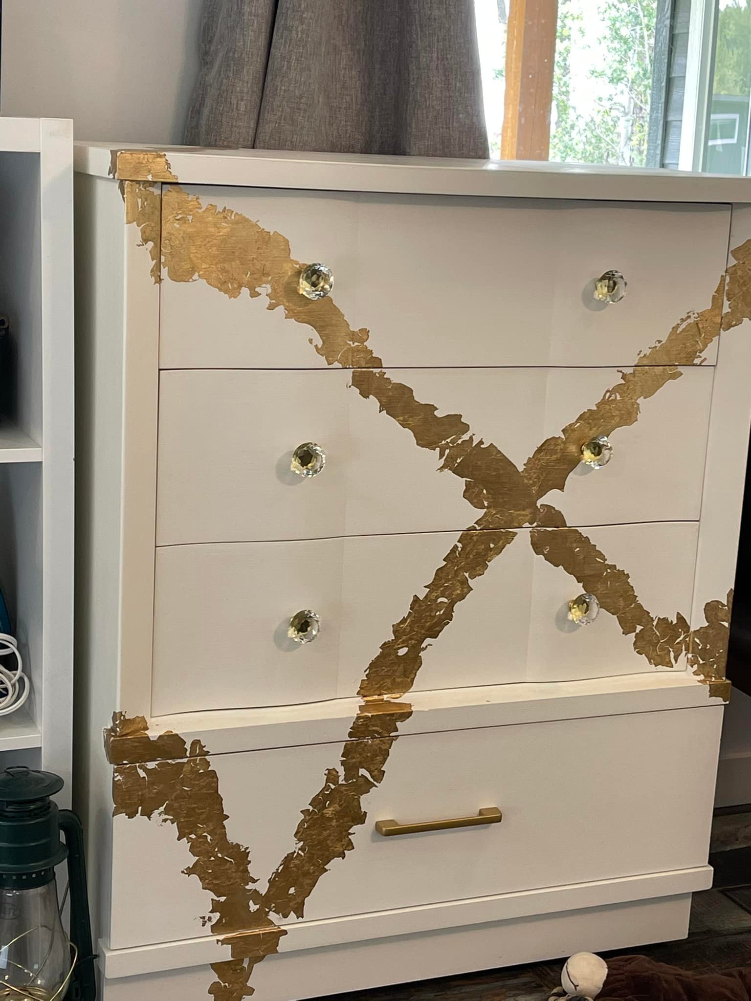 This dresser went through a couple transitions. I painted it white with gold leaf first but it just didn't sell. Now she has a new look with Fusions Bellwood with walnut stain