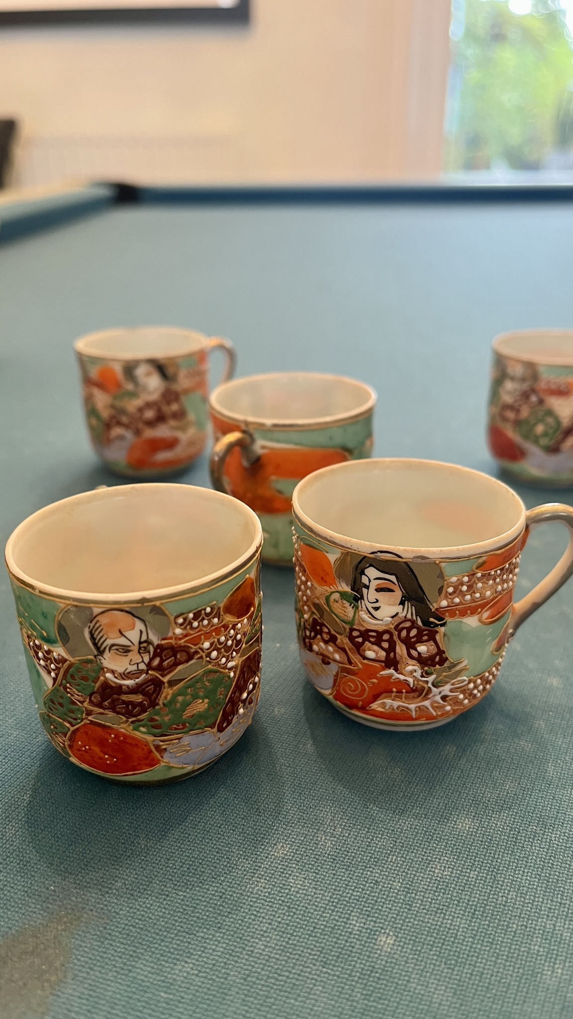 What is the mark on these Japanese hand-painted porcelain cups and
