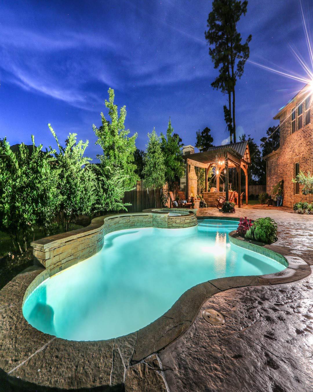 Beautiful backyard freeform,... - Master Pools Guild