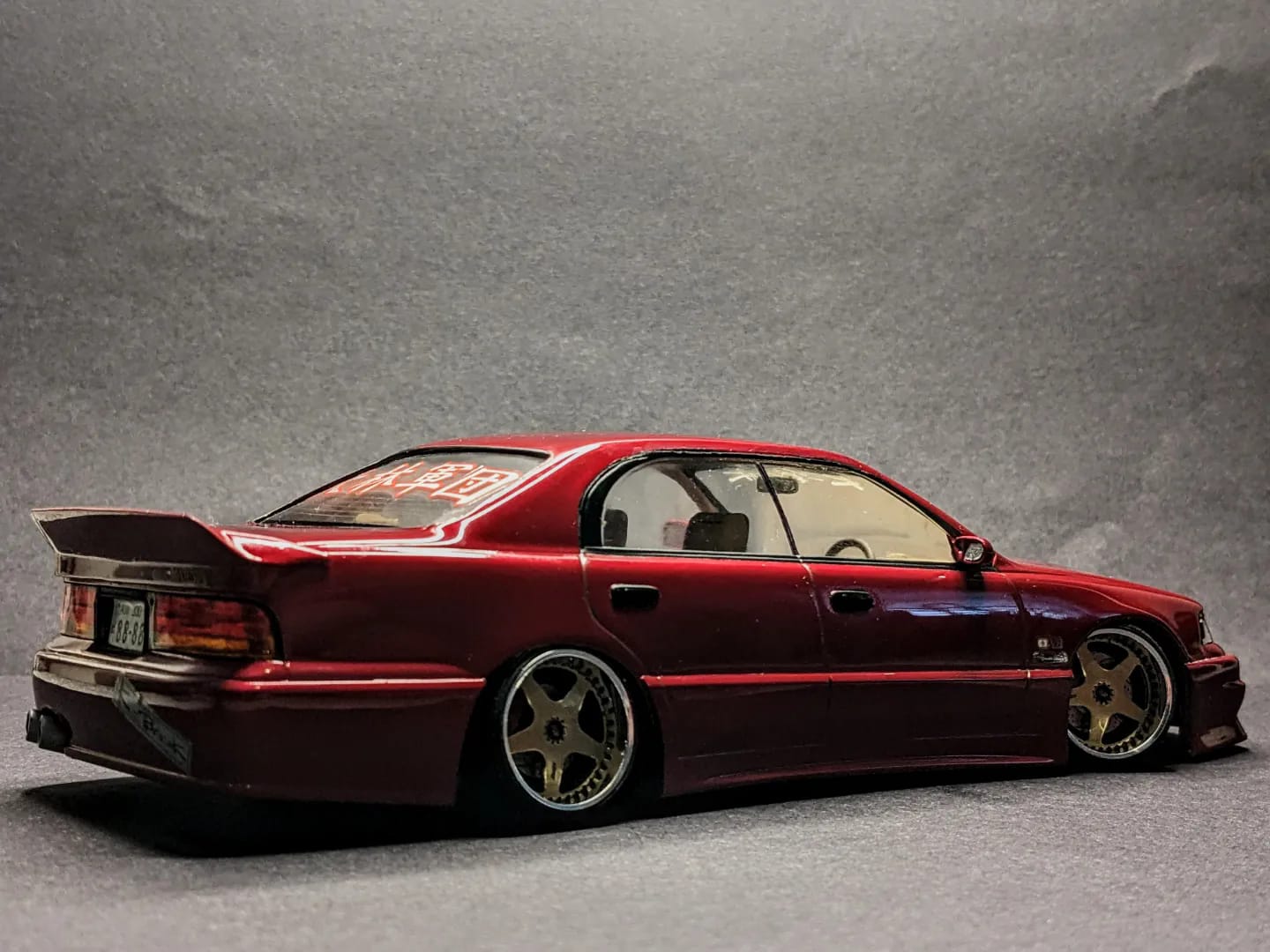 Toyota Crown Majesta model car in wine red by Aoshima