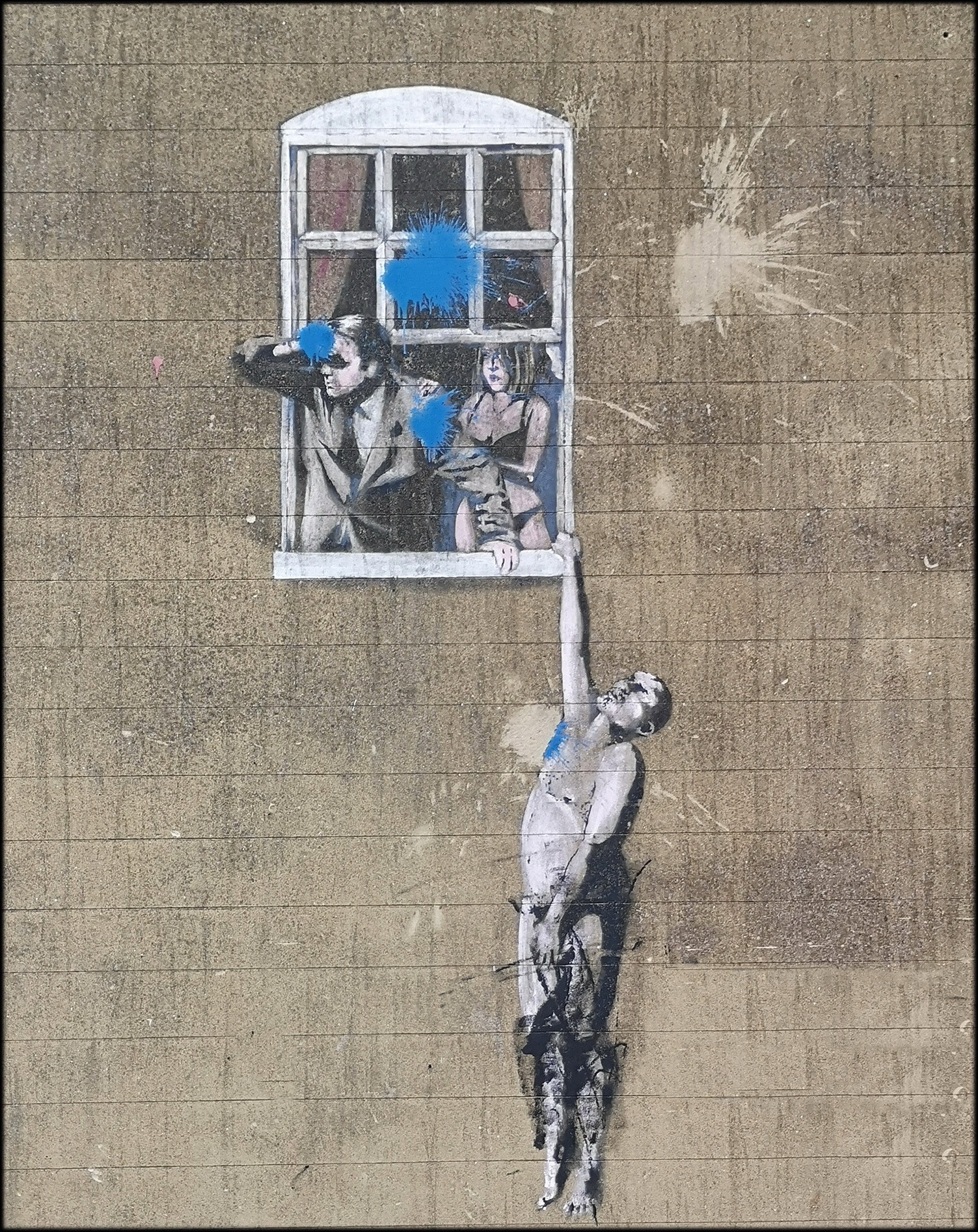 Banksy's 'Boy Meets Girl', found on the side of the Full Moon