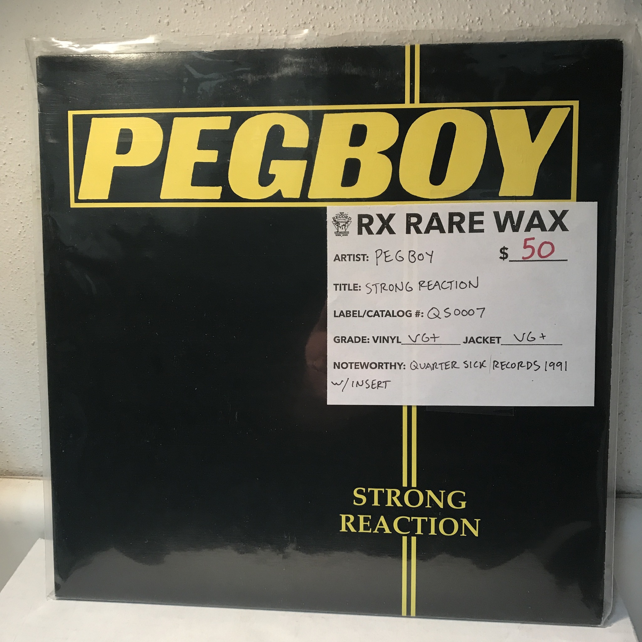 A limited edition yellow vinyl pressing of Pegboy's Strong