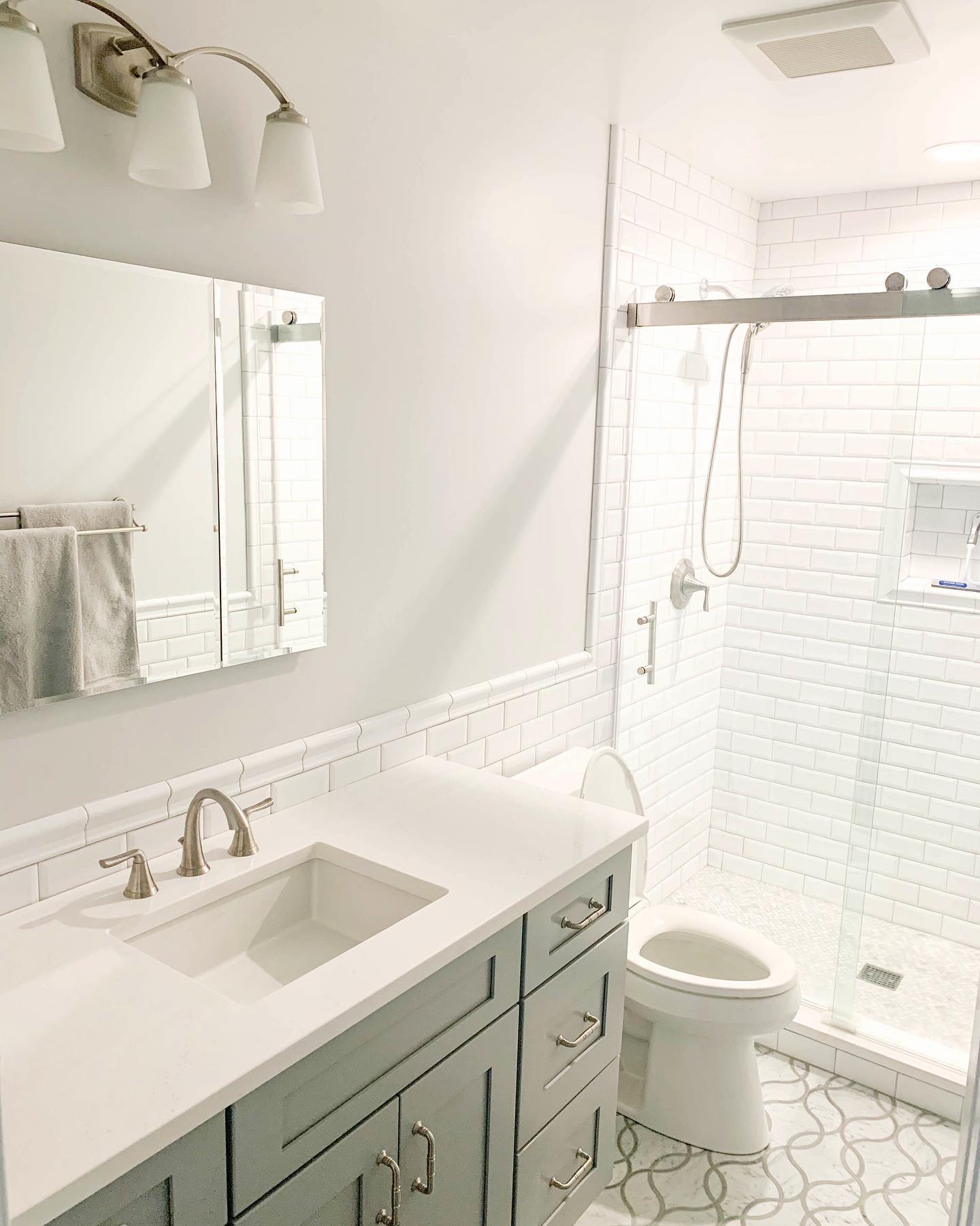 White and bright! In this design,... - Tim White Remodeling