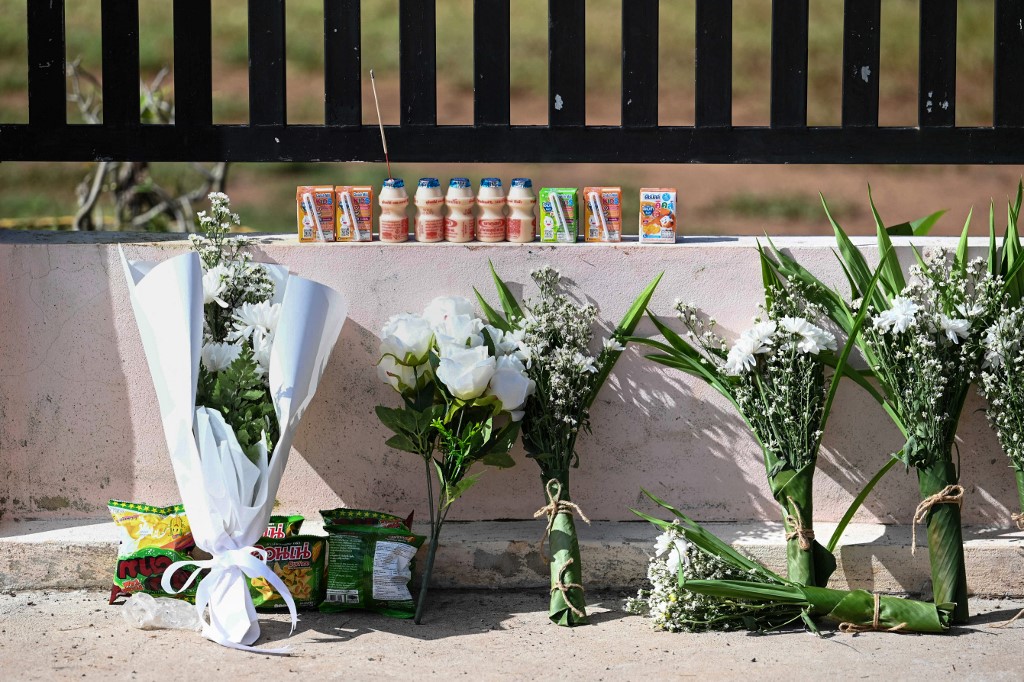 CNA - Bouquets of flowers are placed outside a nursery in Thailand's ...