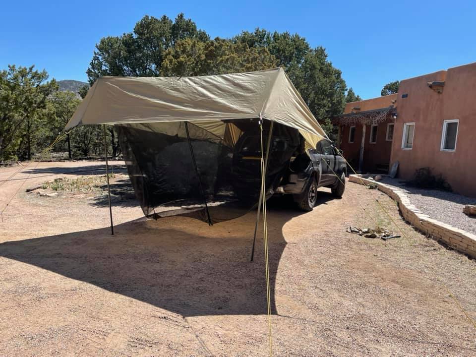 Using Slumberjack Roadhouse tarp with Four Wheel Campers