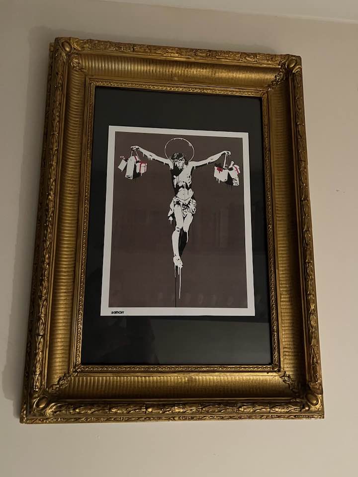 Banksy's Christ with Shopping Bags print