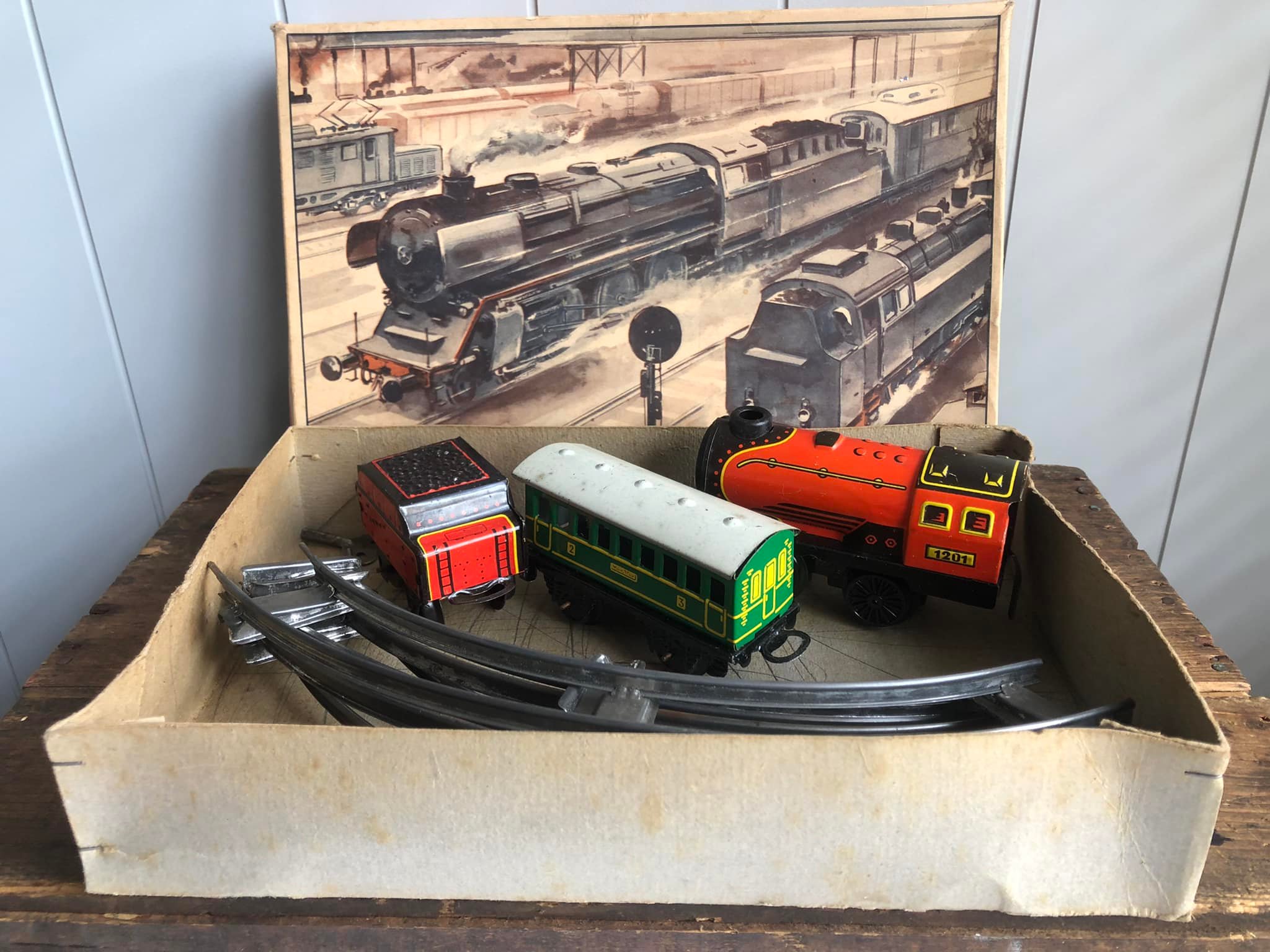 What is this vintage West German wind-up tin train set?