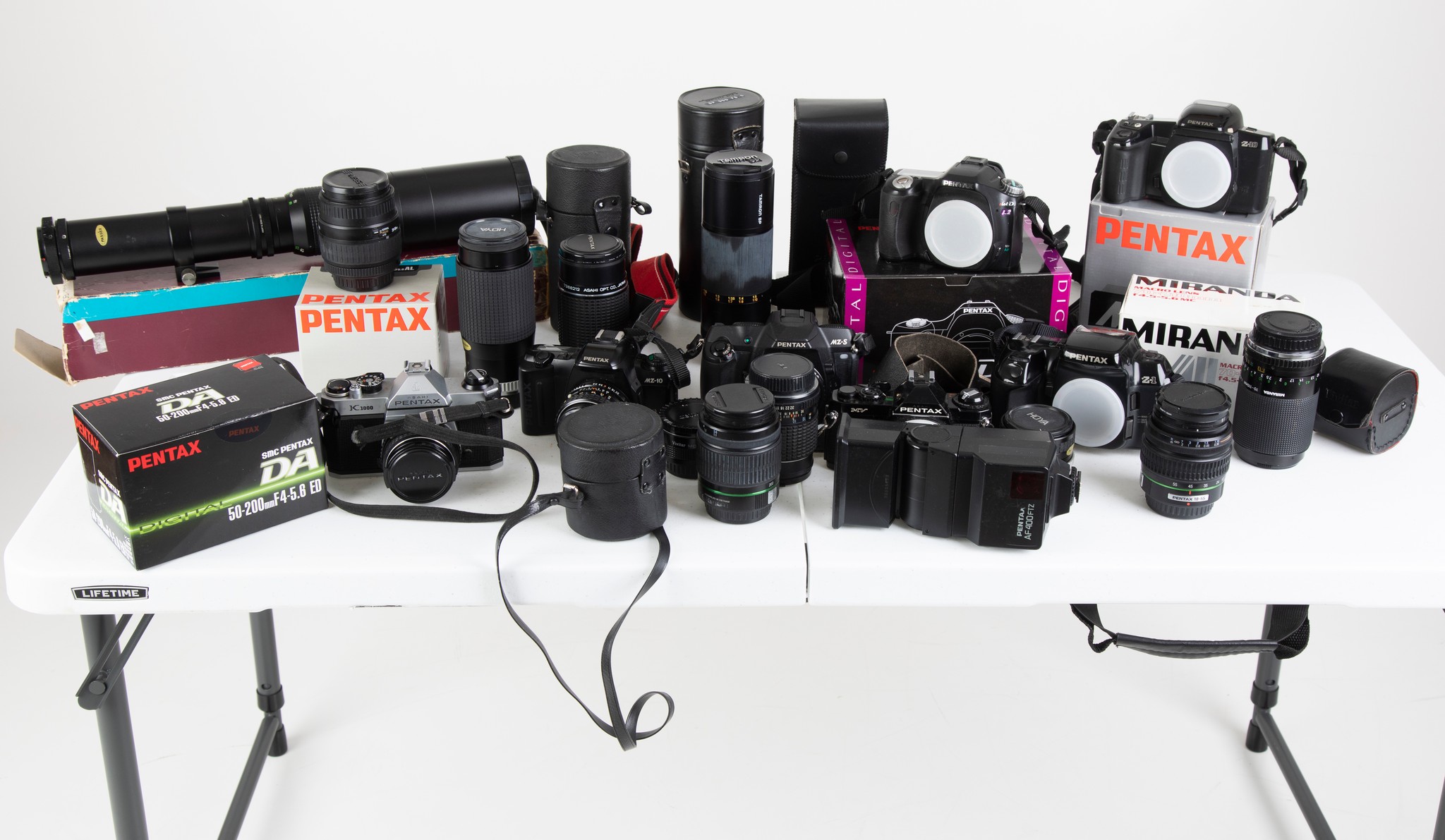 I have a collection of Pentax cameras, flash,cases, Pentax bag and