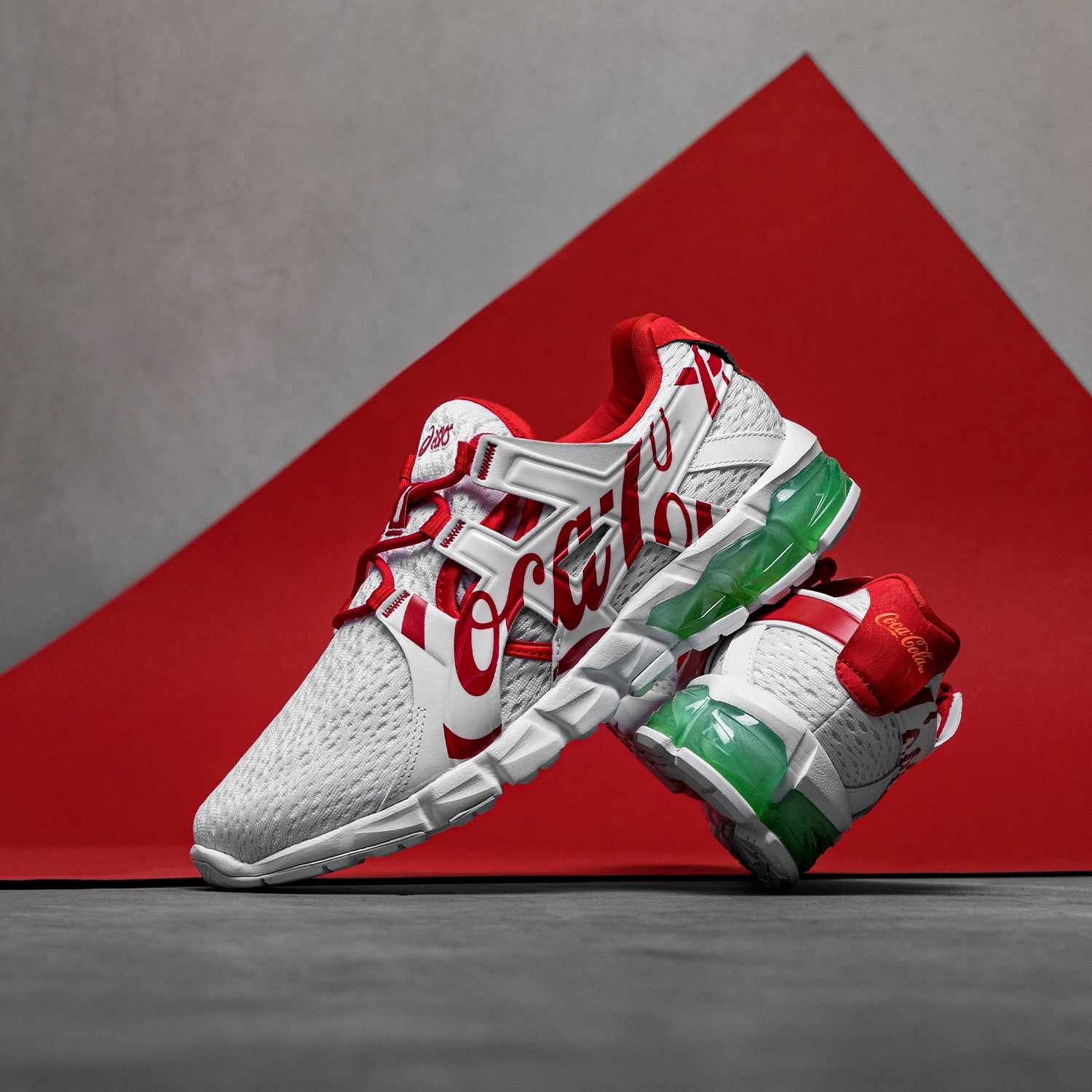 The shoe showcases distinct characteristics of both Coca-Cola and