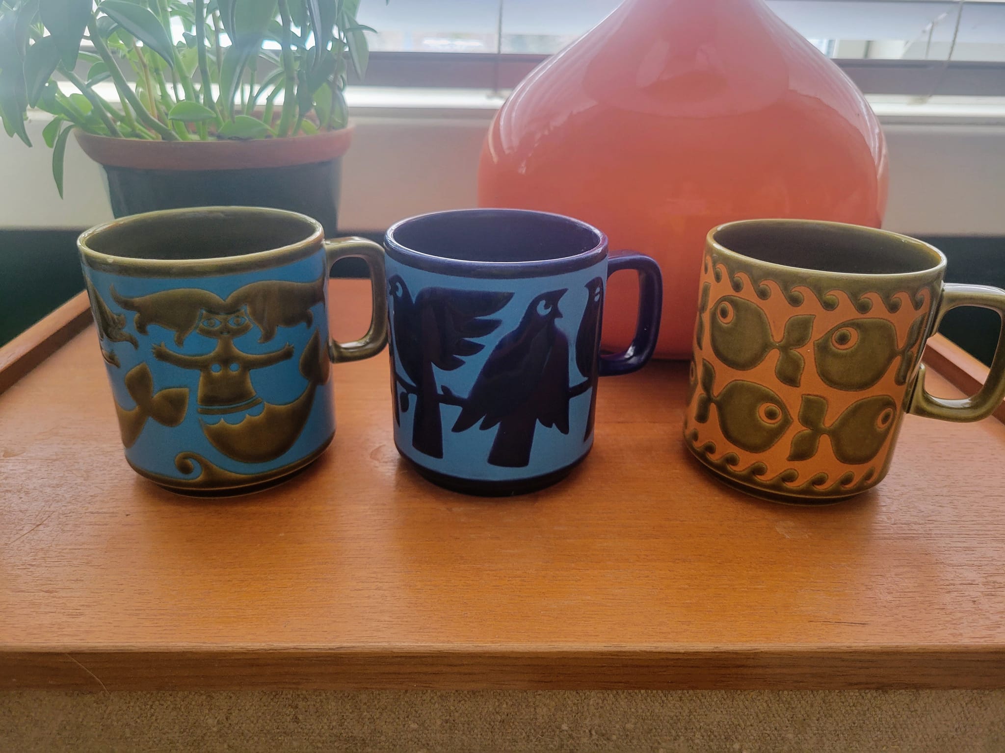 Collecting cute Hornsea mugs in England