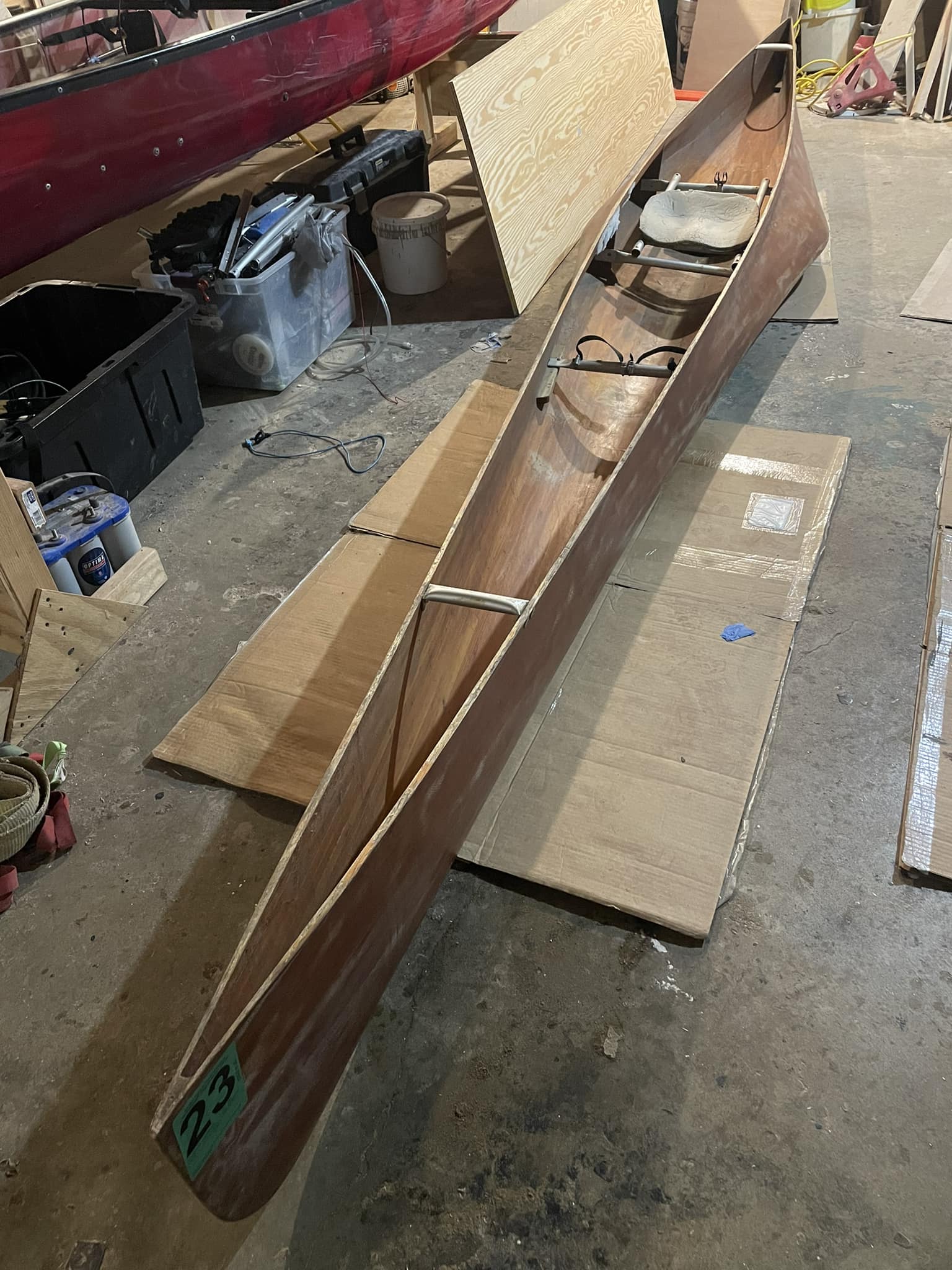 What is the historical value of a Jenson built J-180 canoe and