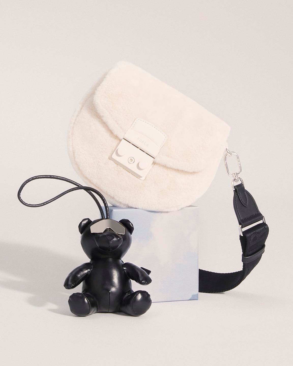 Smart design, free-spirited charm. Adénorah with her Furla
