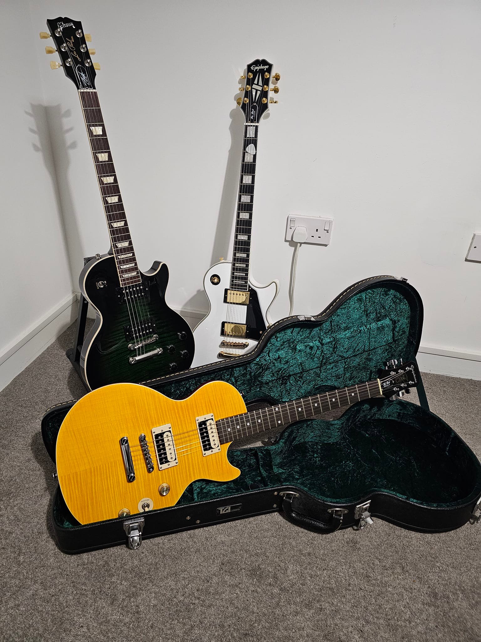 My Gibson Les Paul next to my recently acquired Epiphone Roadie