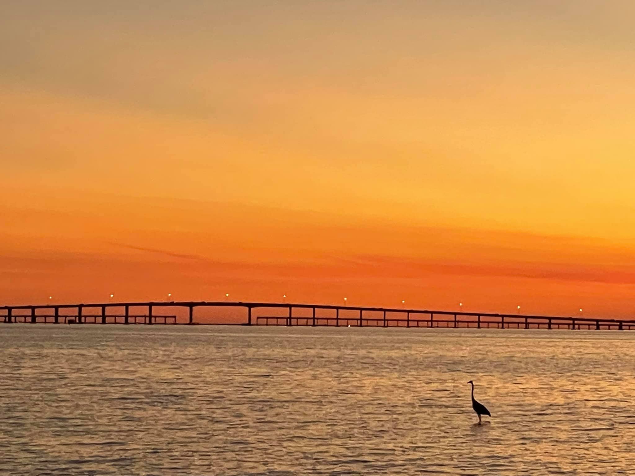 Nice sunset view of the bridge to the best beach in the world…shhhhh.