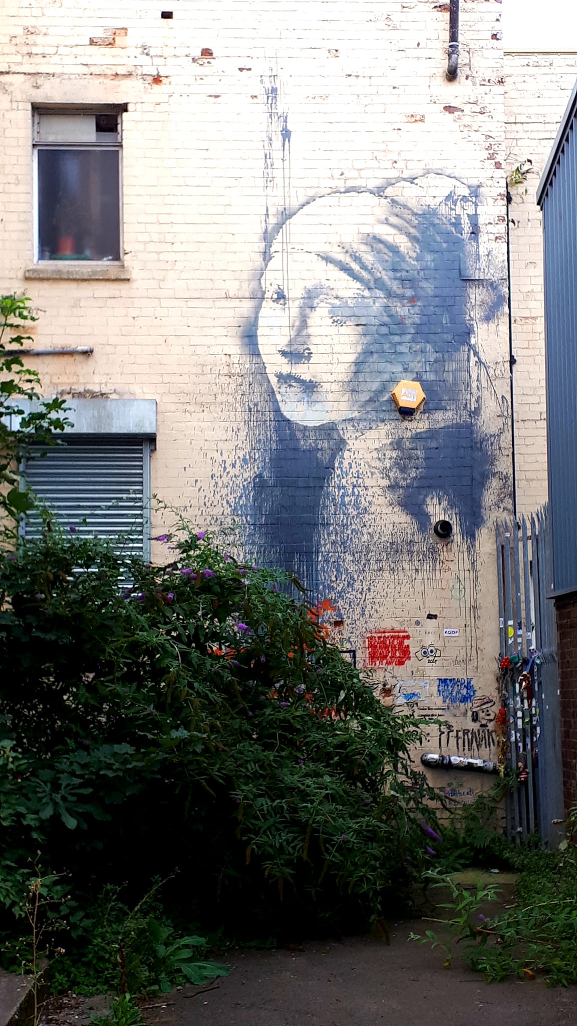 Banksy's 'Boy Meets Girl', found on the side of the Full Moon