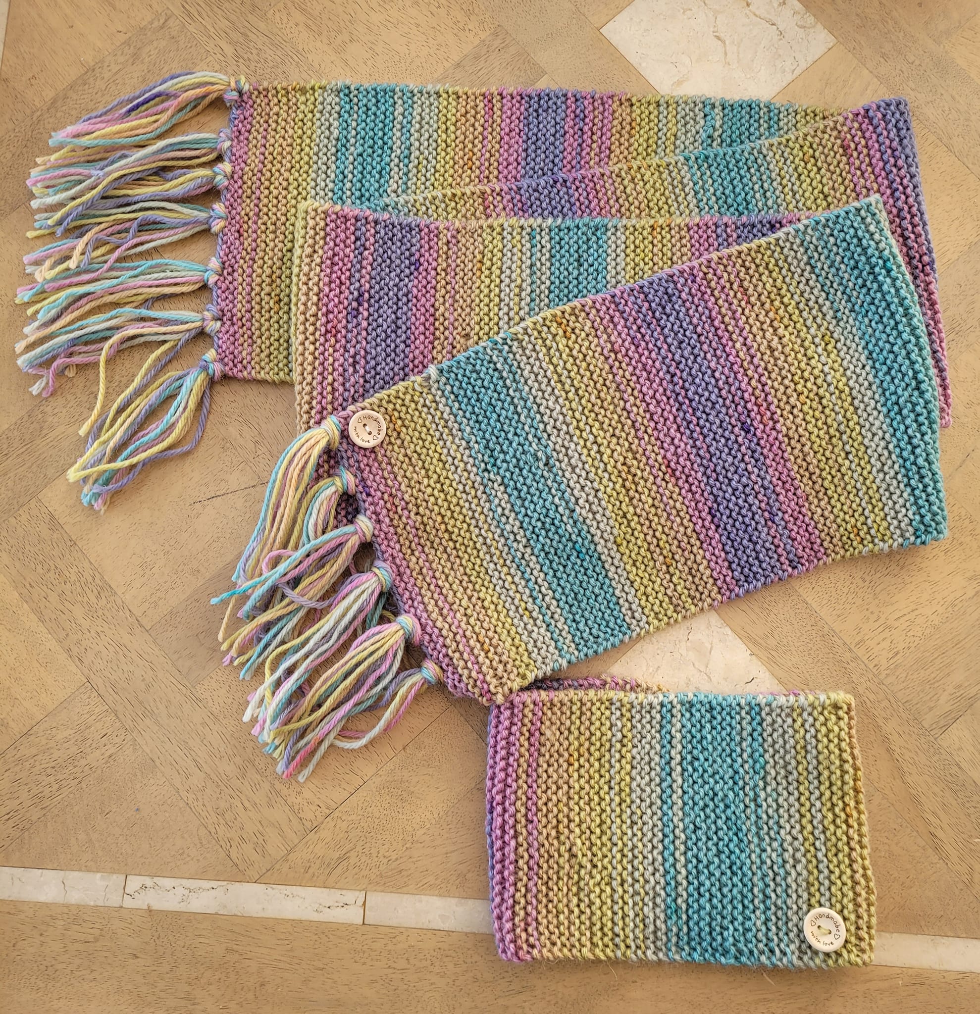 Knitting a neon rainbow Mina's sweater with alterations