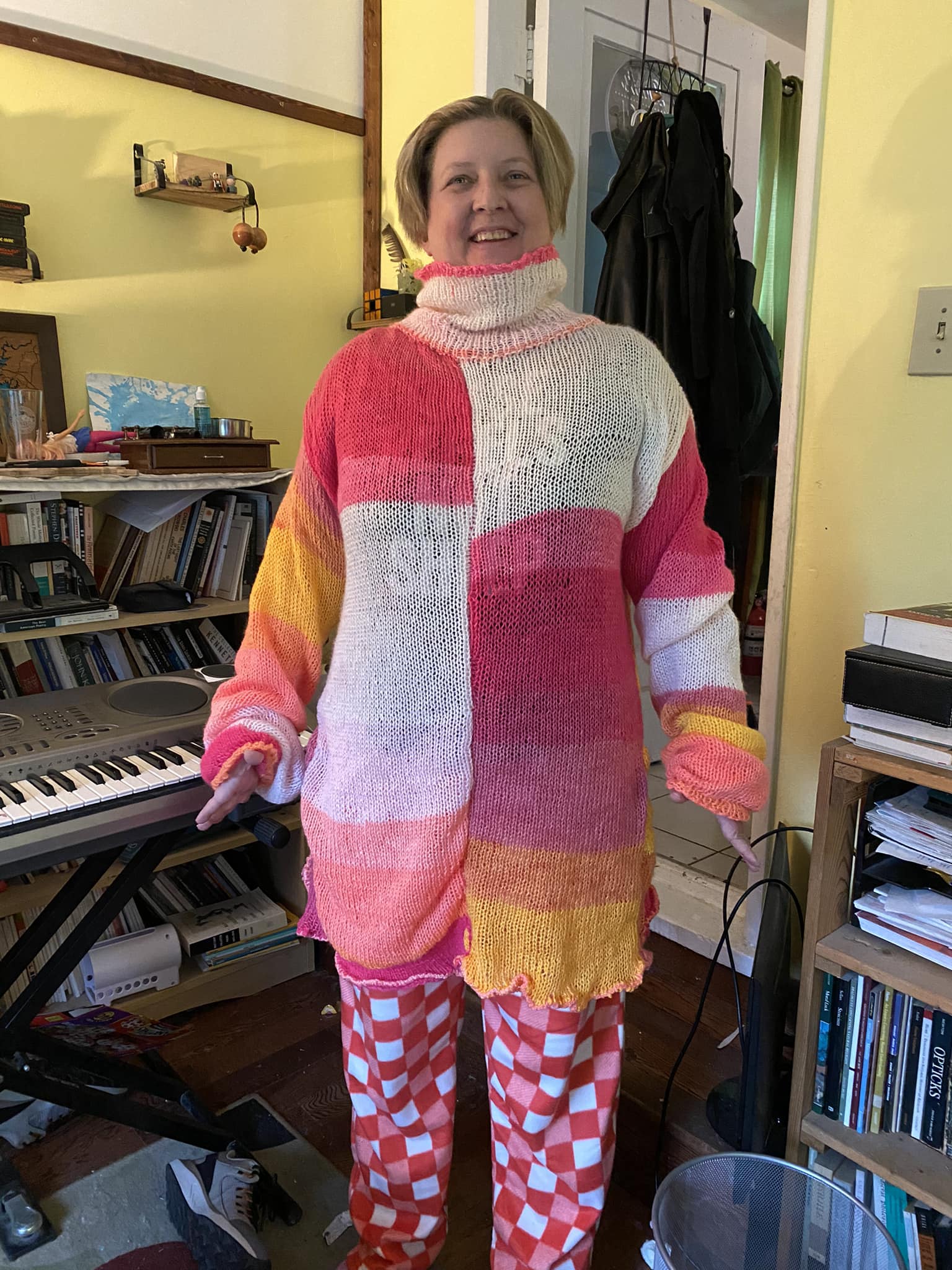 Chaos knitting sweater with random colors and improvised pattern