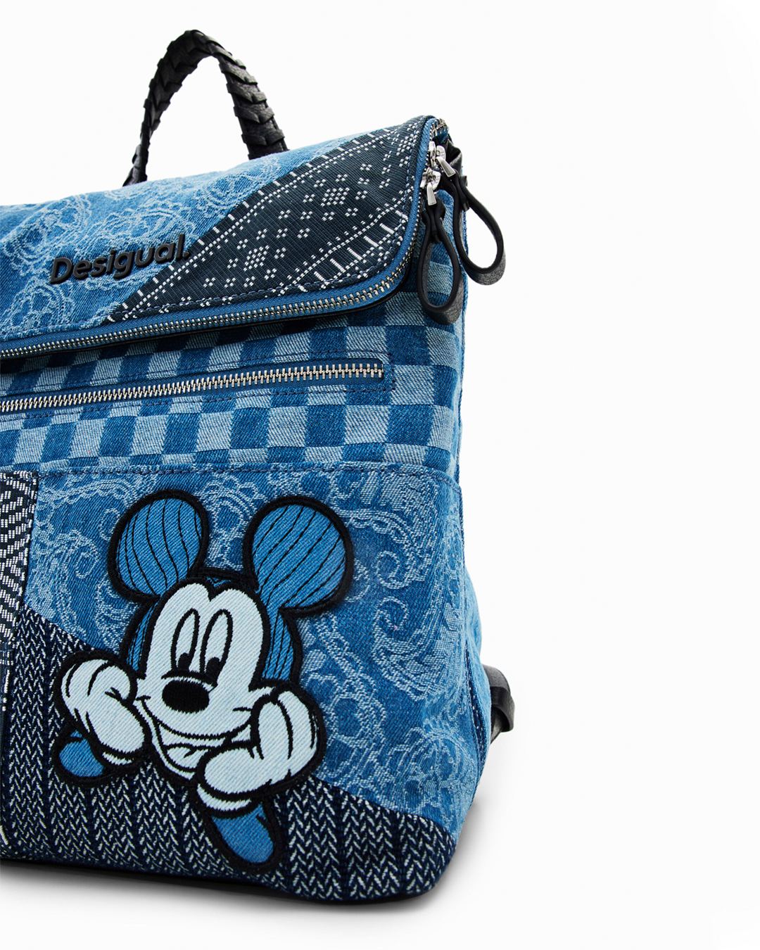 Mickey Mouse goes back to basics on this denim mini backpack