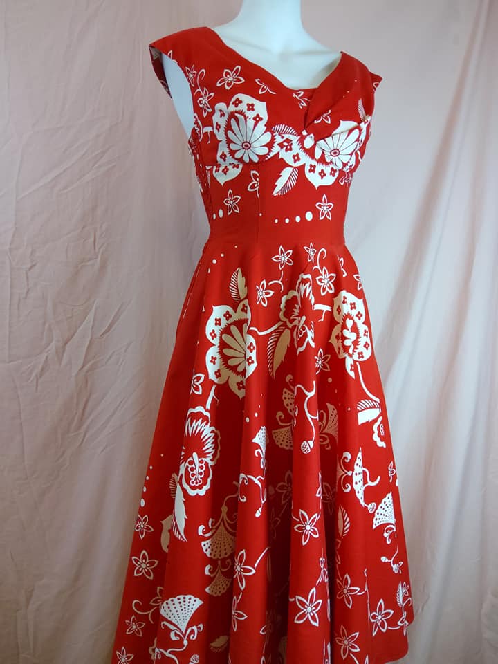 concetta halter mini dress in red & cream floral NWOT Pink with tie the back and Pearl studs sporadically placed on front of dress only. Size is Large Msrp$60. Meet up Central Maui in covered parking at KAAHUMANU style:Vintage Inspired