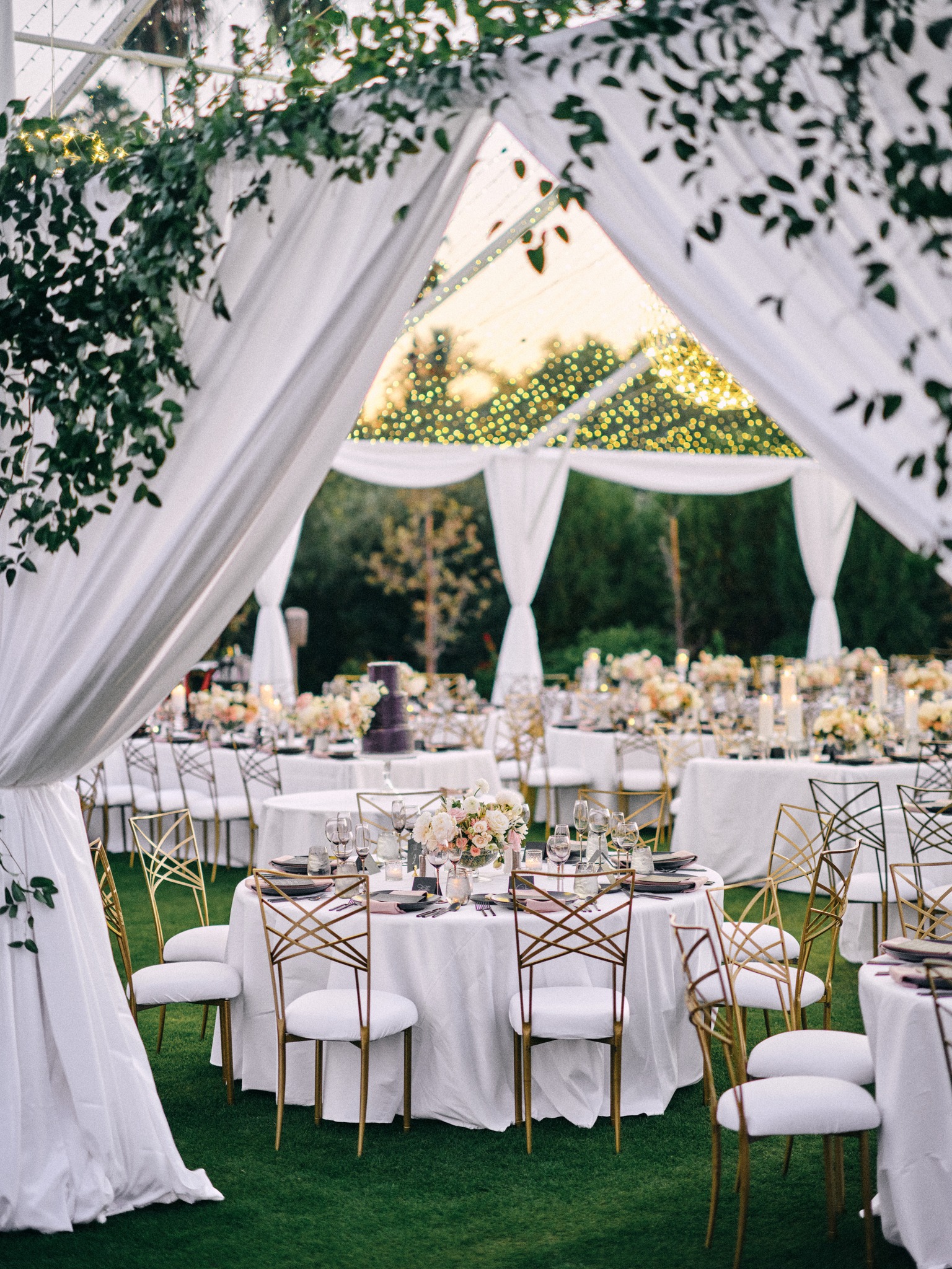 A peek inside a magnificent tented... - Bright Event Rentals