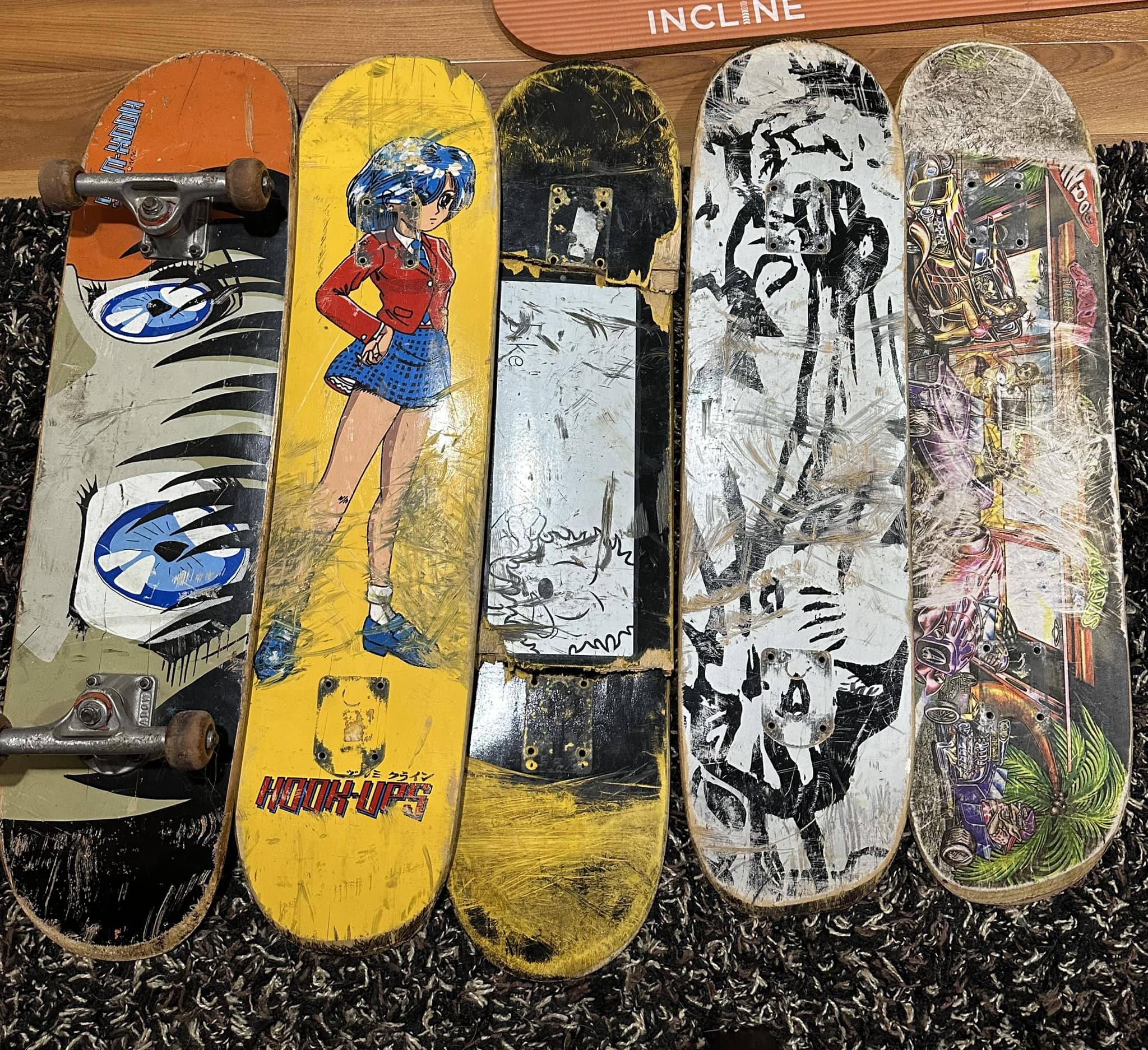 Vintage chocolate skate deck with robot graphic