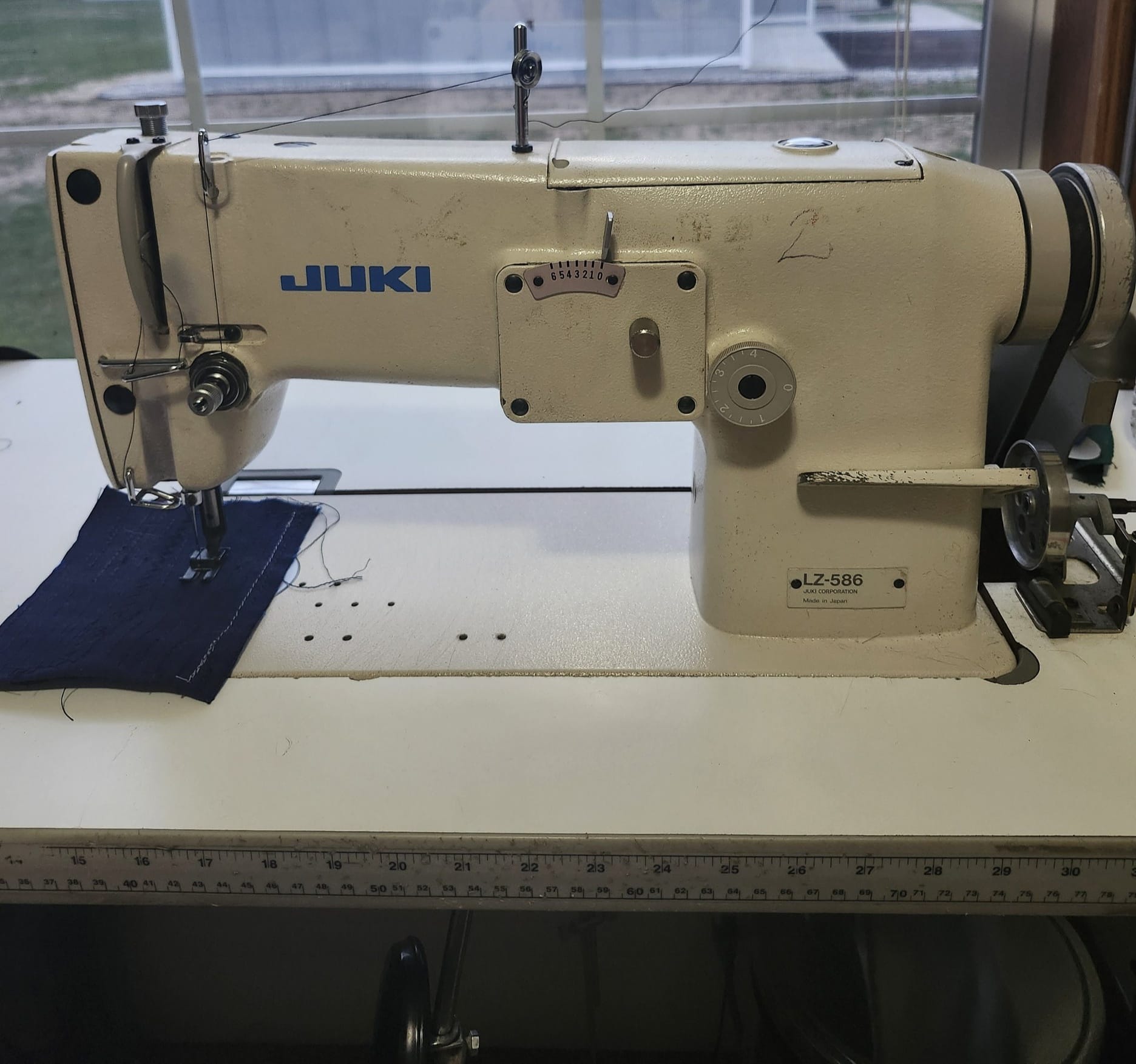 How to fix a Juki LZ-586 industrial sewing machine timing issue?