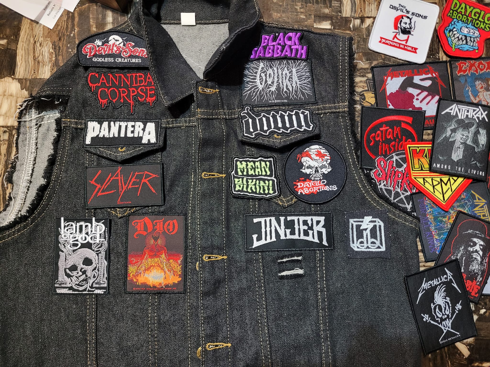 Battle vest with concert patches from bands seen since 2024