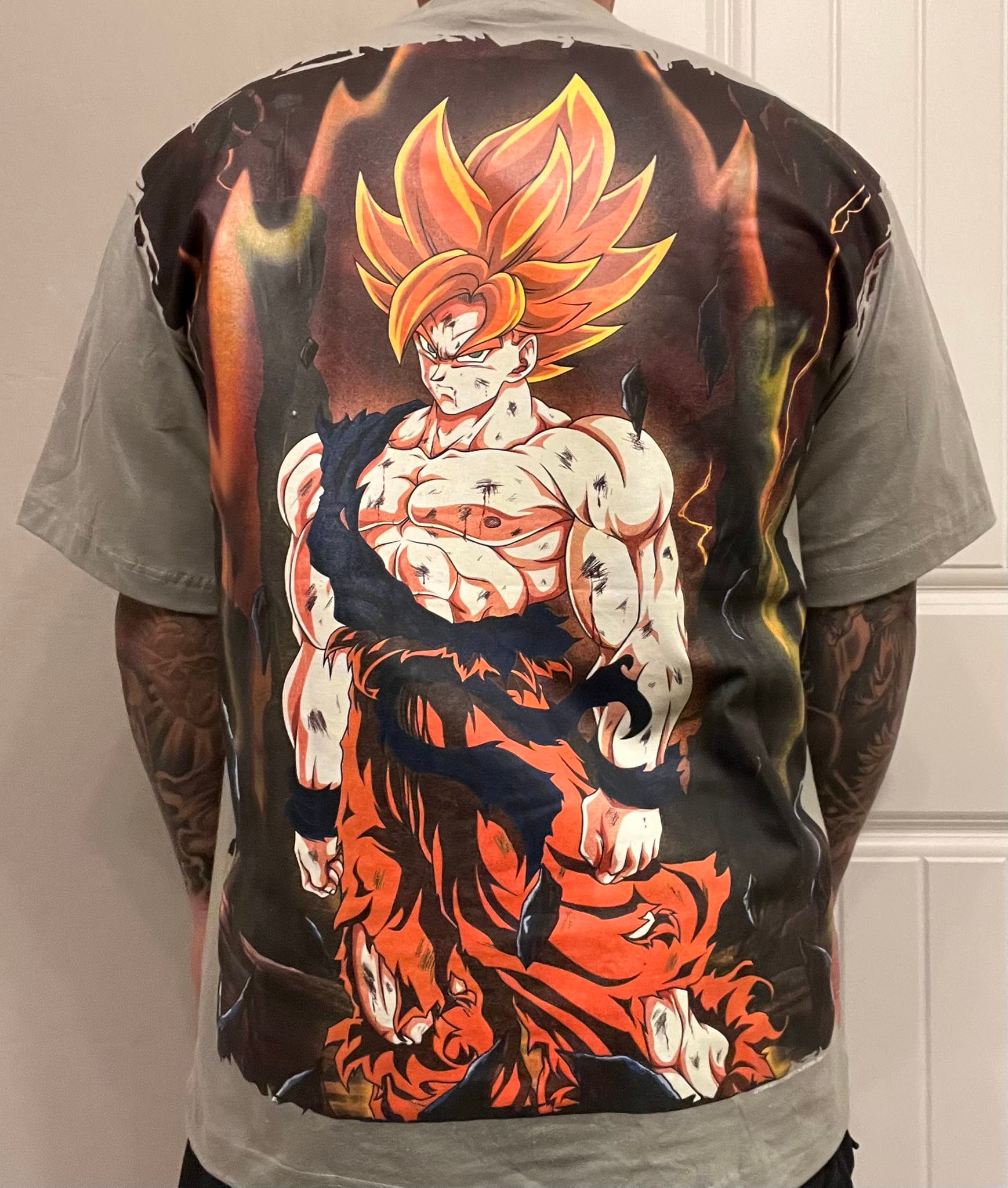 A couple of my bootleg dbz shirts, behold their epicness ?