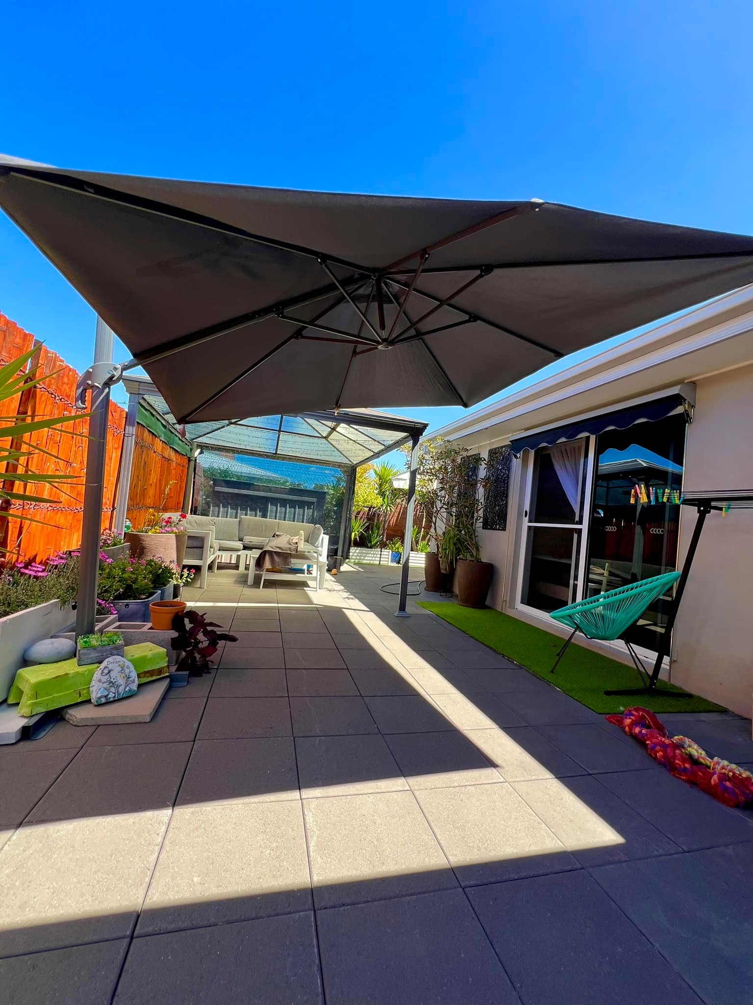 east end patio offset umbrella 10 ft  Premium Patios tucking perfectly into corners East-facing outdoor cantilever umbrella benefits