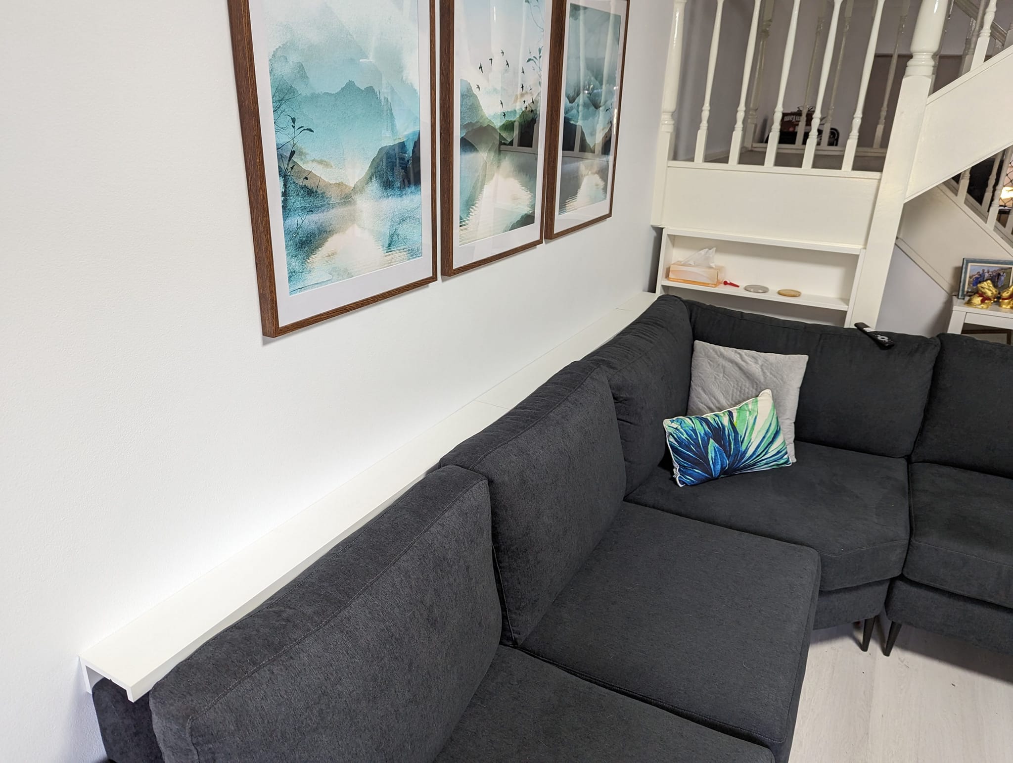 Ikea Mosslanda Picture Shelf Hack for a Couch Ledge