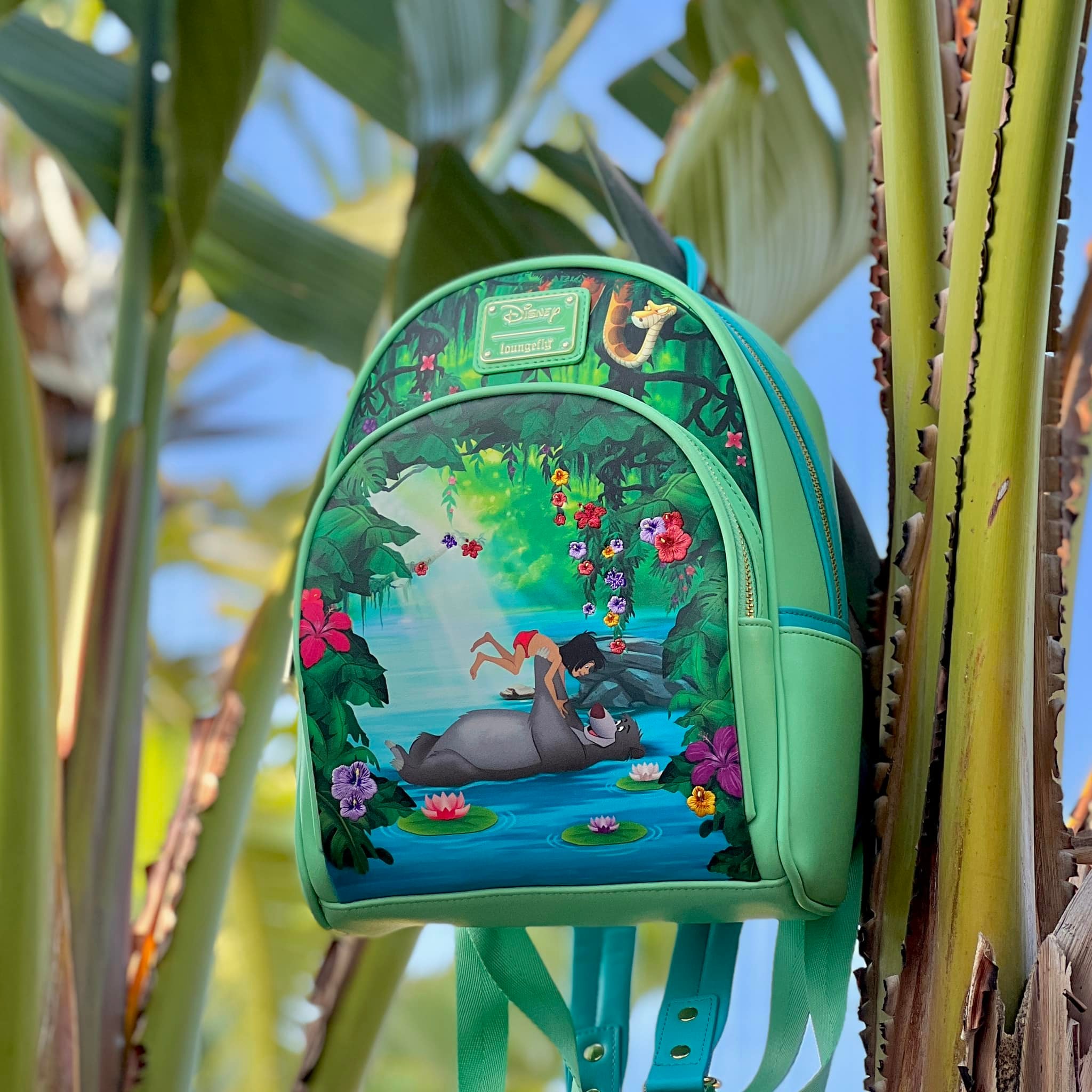 jungle book mini backpack EXCLUSIVE DROP: Loungefly Disney Satchel he overcomes his reluntance to leave and braves the jungle’s many perils Loungefly Disney's The Jungle Book