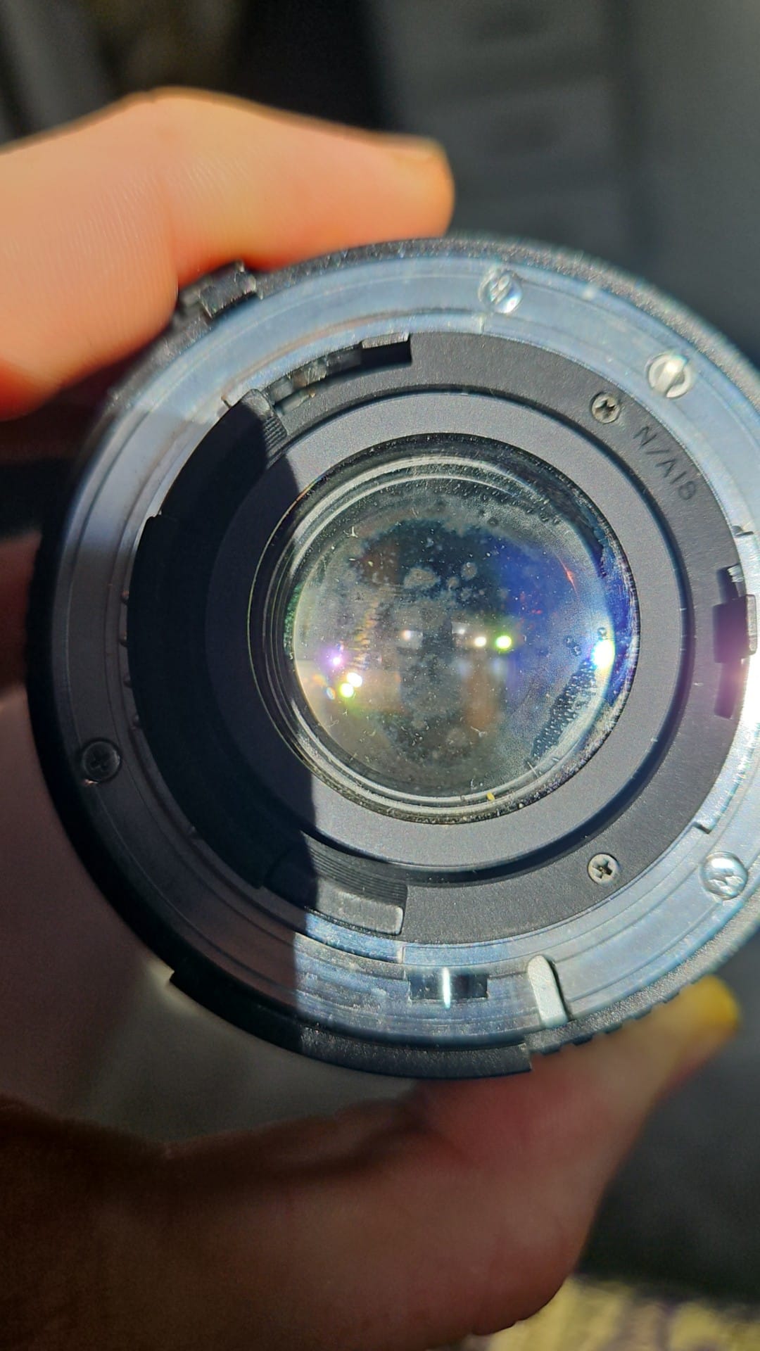 Videos or guides for cleaning Tokina AT-X Pro 28-70 rear element
