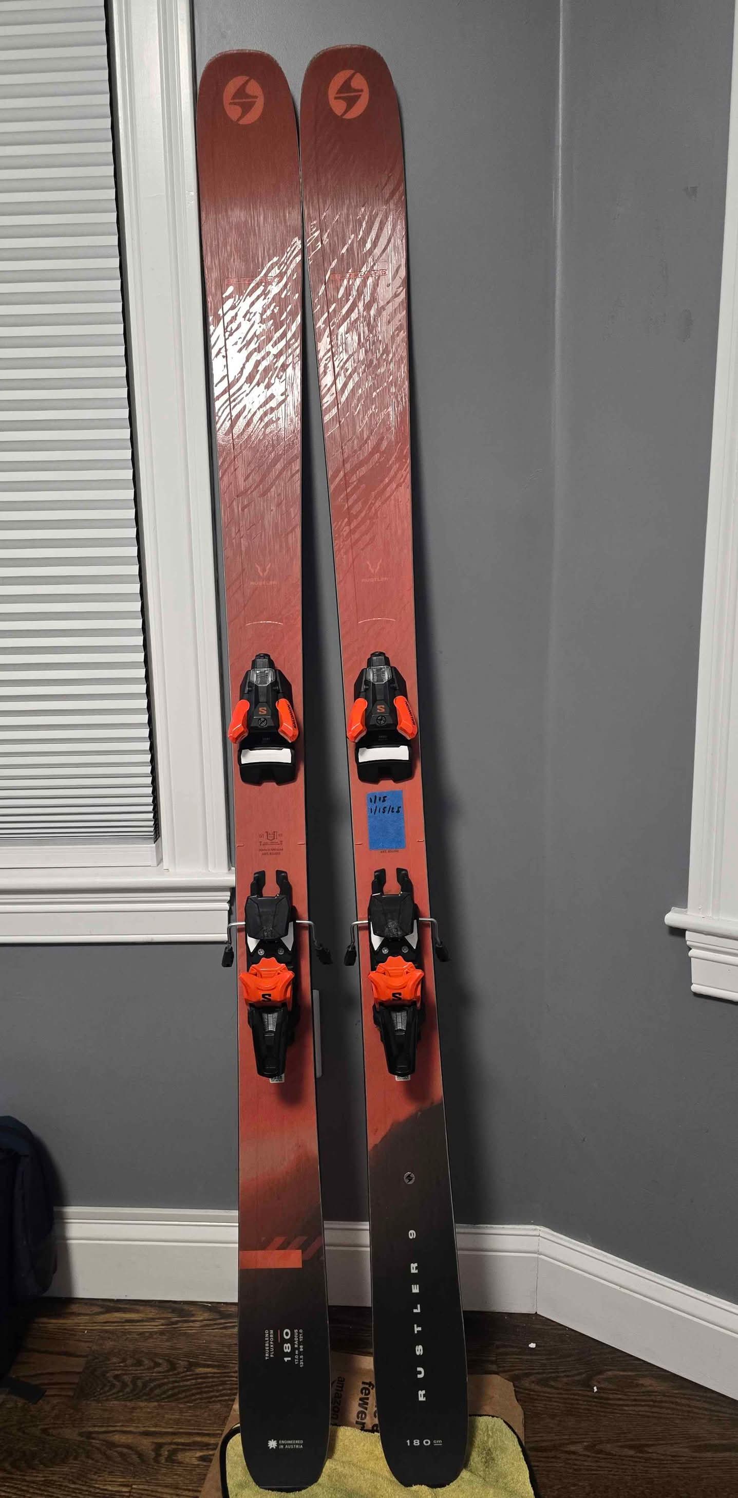 Selling a pair of 2025 Blizzard Rustler 9 skis in 180 length with 
