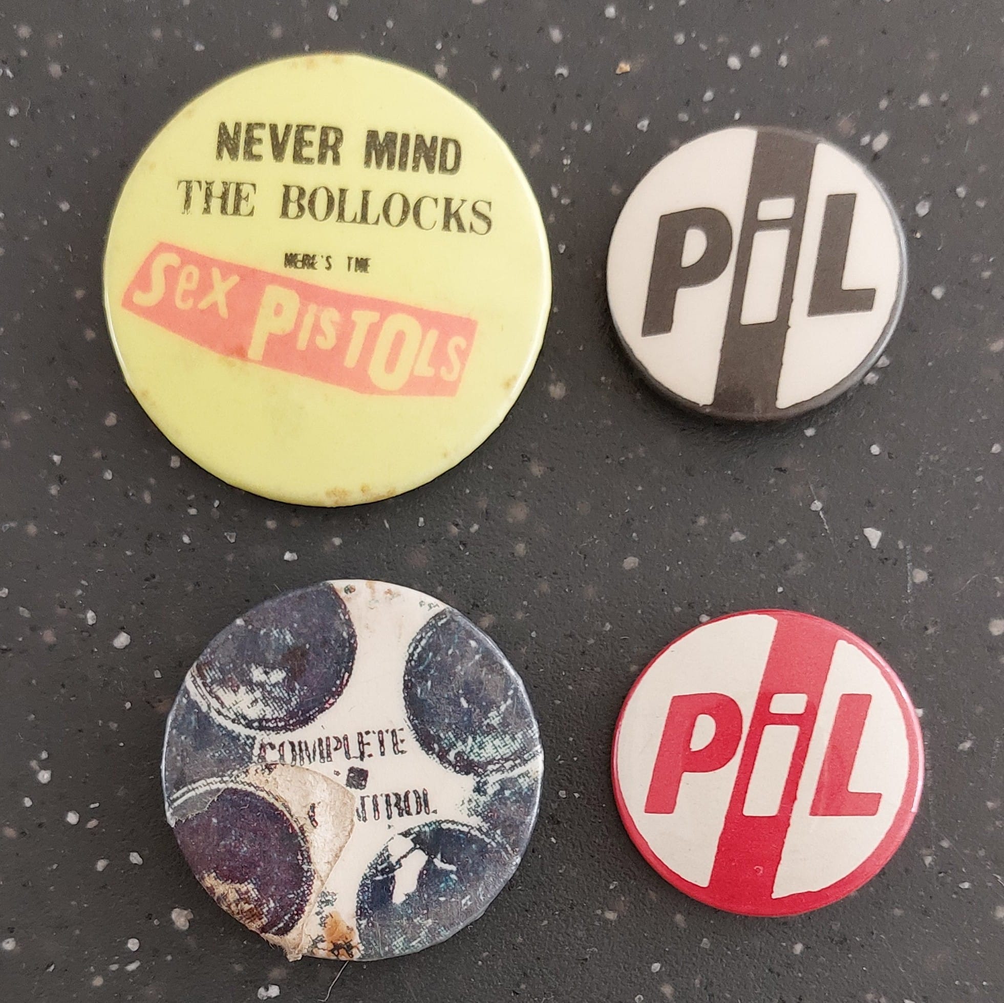 Vintage Sex Pistols and Public Image Ltd buttons