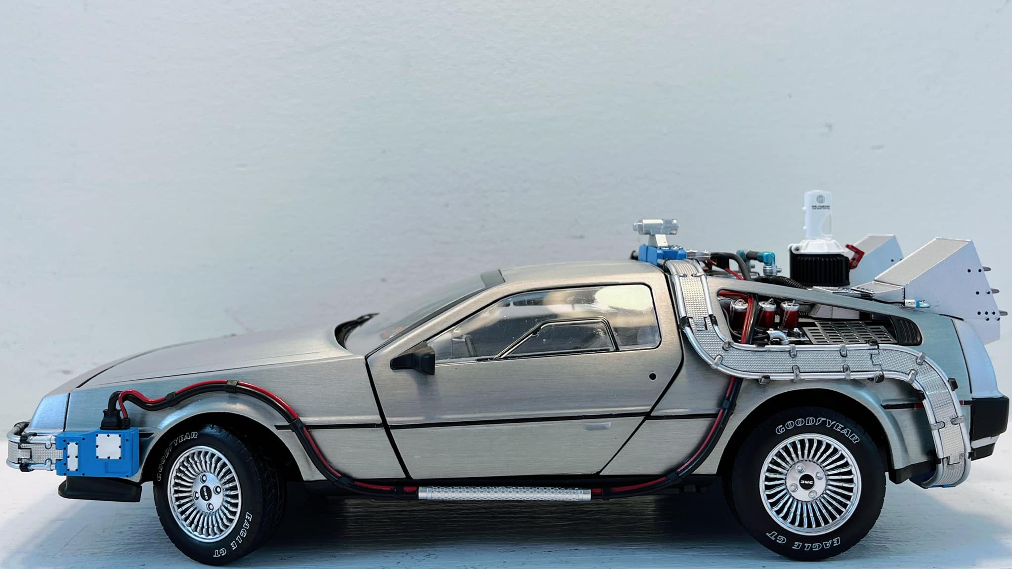 Enjoying Back to the Future trilogy with Delorean model