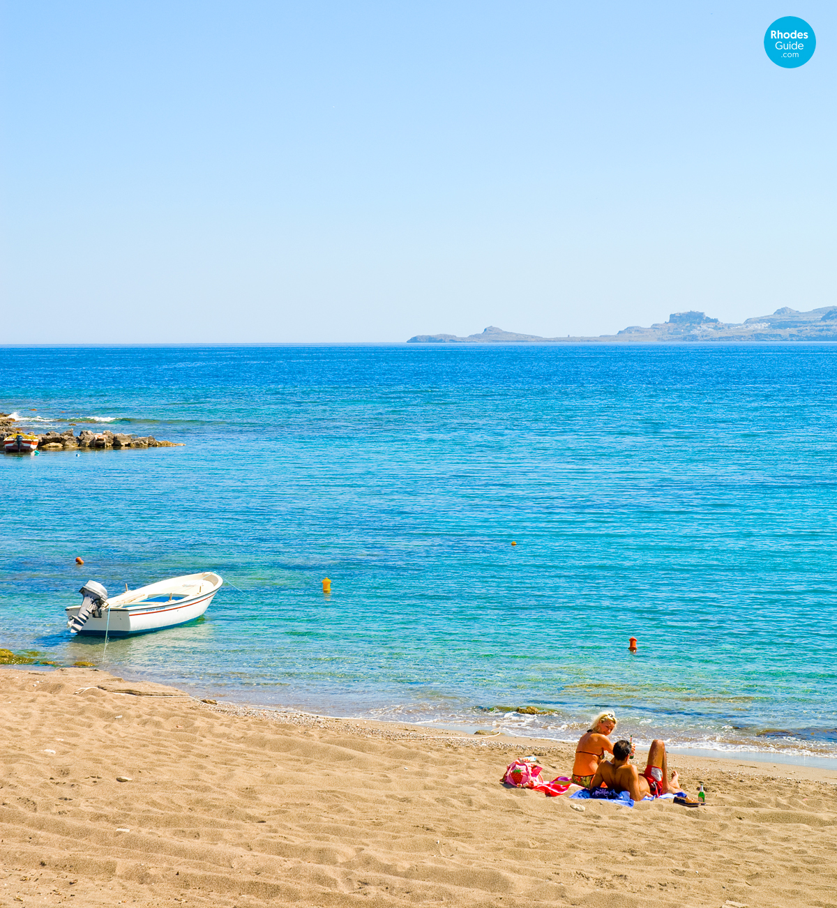 Rhodes Rhodos island - RhodesGuide.com - Chilling at Haraki Beach Photo ...