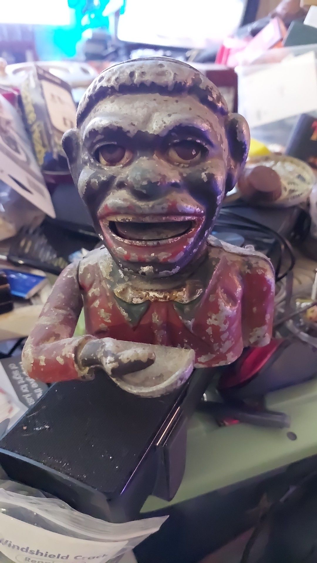 What is this antique mechanical bank called and how much is it worth?