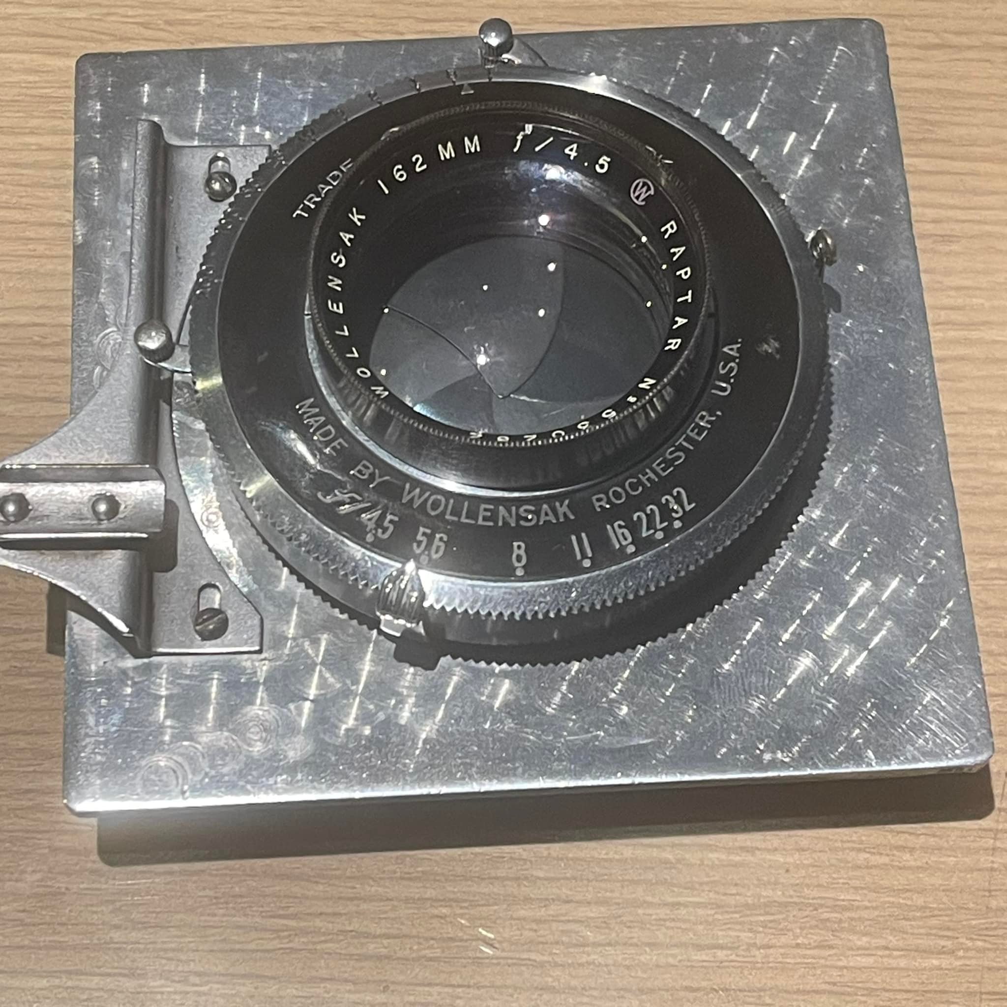 What is this old wooden 4x5 camera with Wollensak lens and Optimo