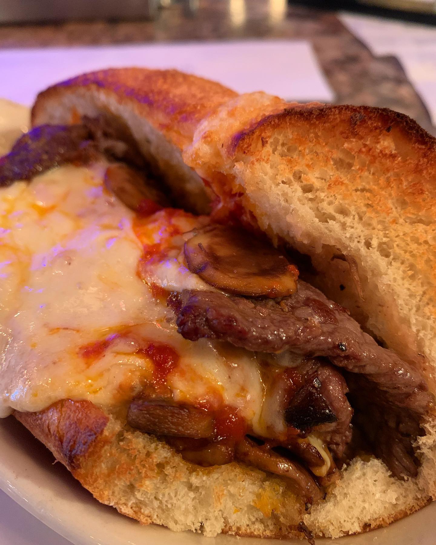 Brooklyn - Shaved prime rib and mushrooms, sautéed in butter. Smothered ...