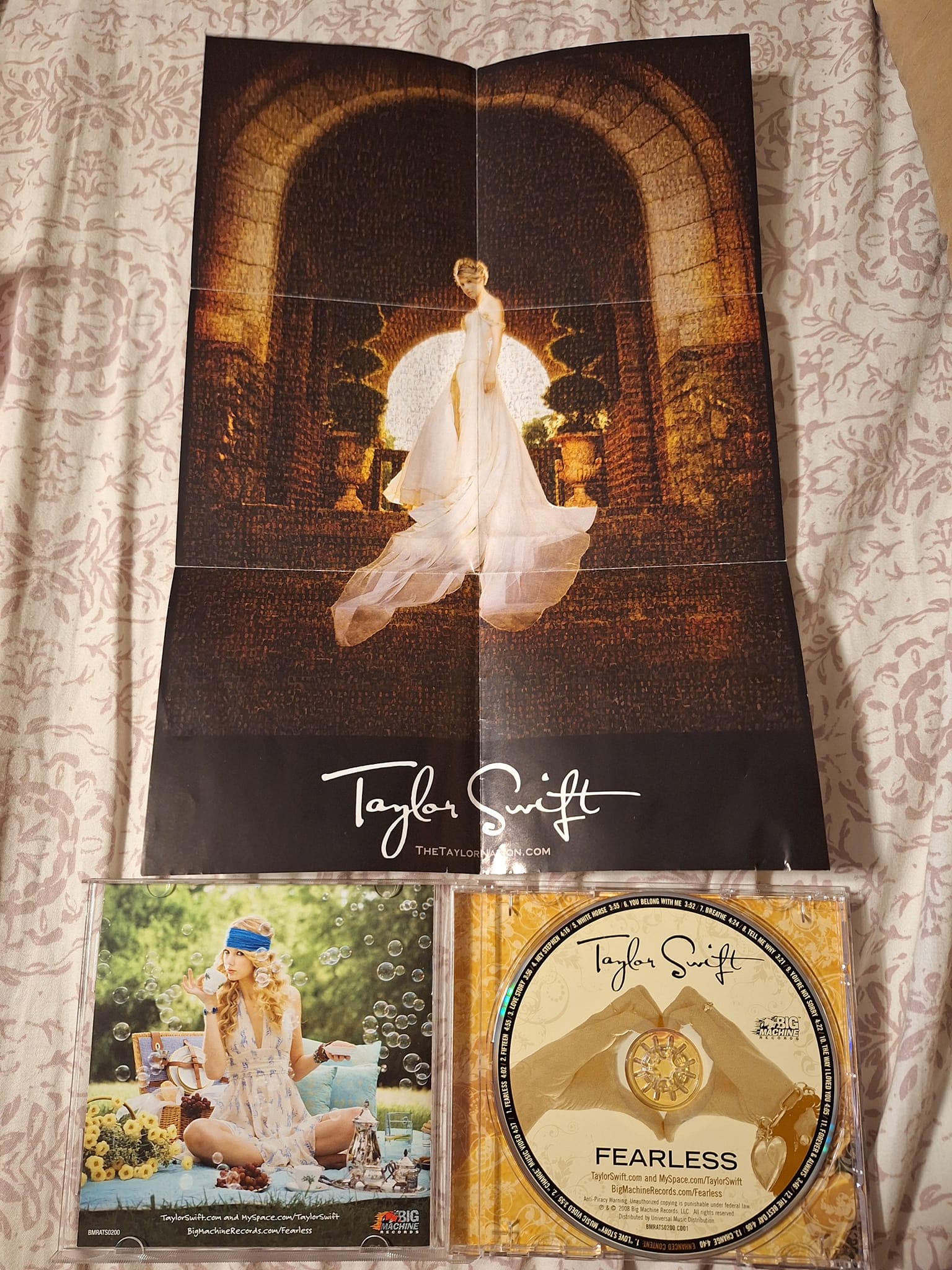 What's on the back of Taylor Swift's Sweat and Vanilla poster?