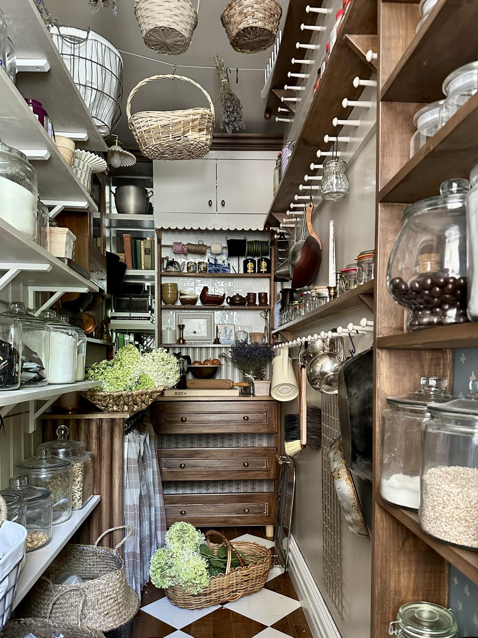Hanging baskets on ceiling for extra pantry storage