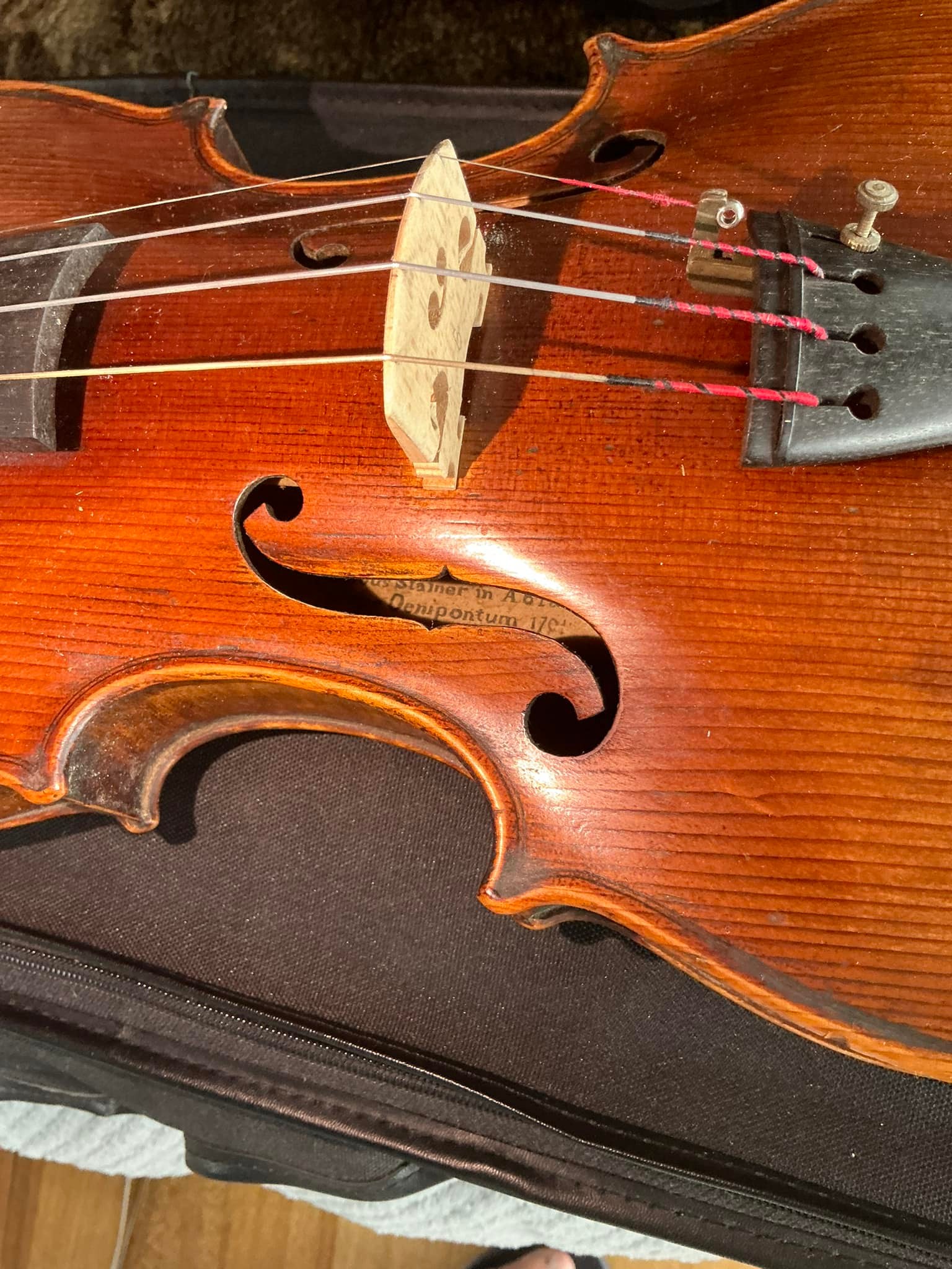 Is this a genuine Stainer violin and what's its value?